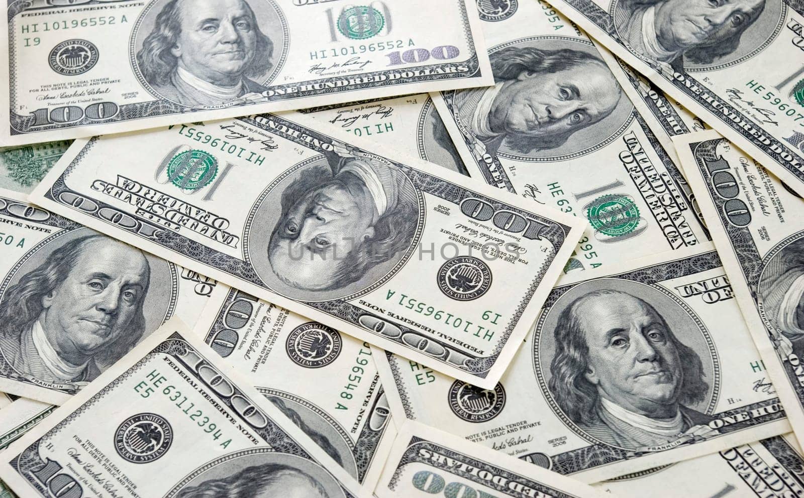 american dollars arranged at the background