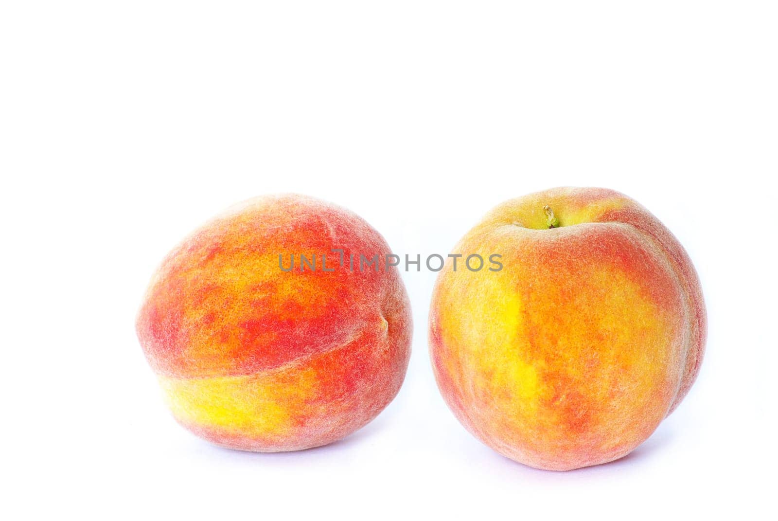 two peach isolated on white