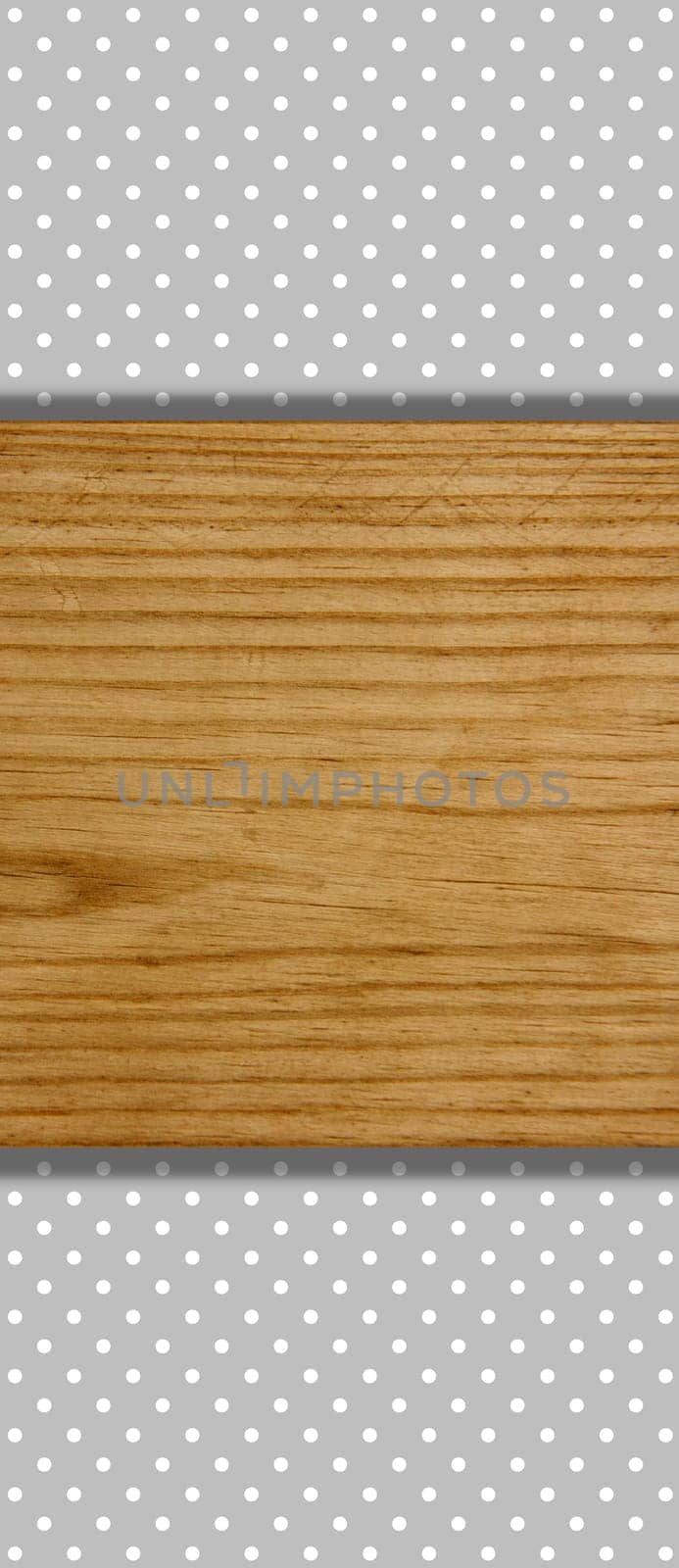 Dotted grey background with wooden board for text