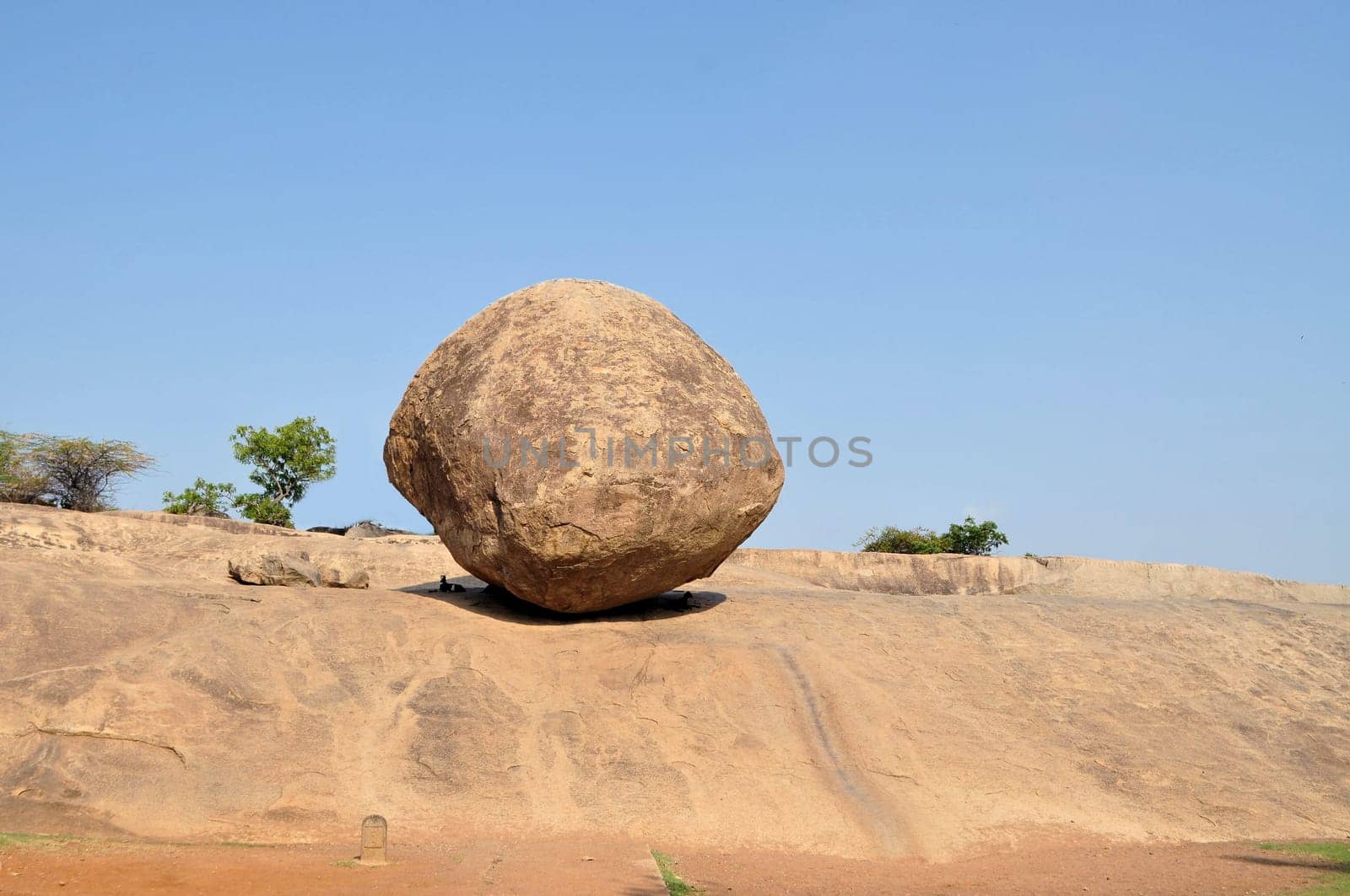Krishna's butterball - balancing giant natural rock stone. Mahabalipuram - Mamallapuram , Tamil Nadu, India
