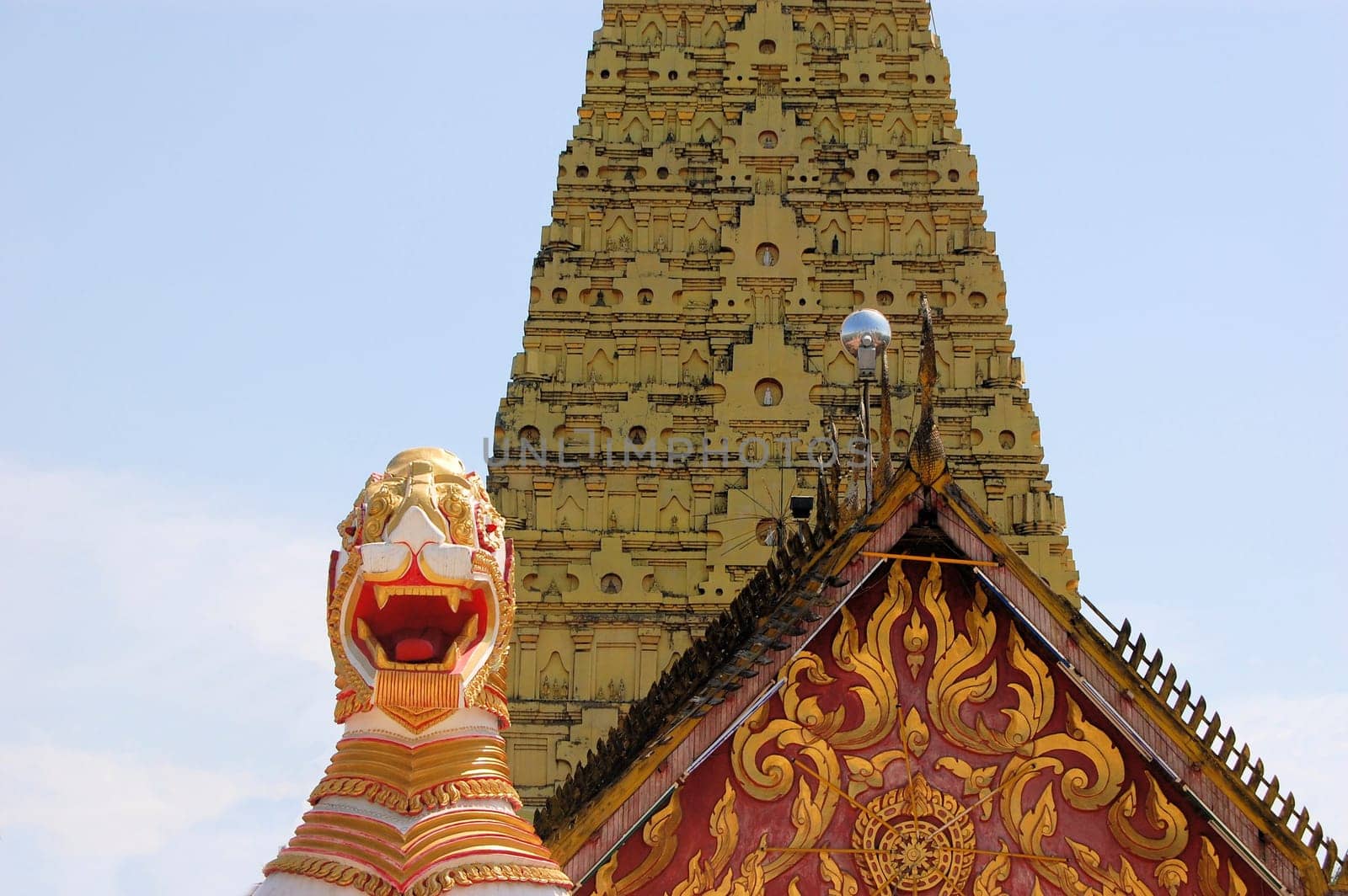 Burmese temple with lion in traditional architecture in Sangkhlaburi, Thailand