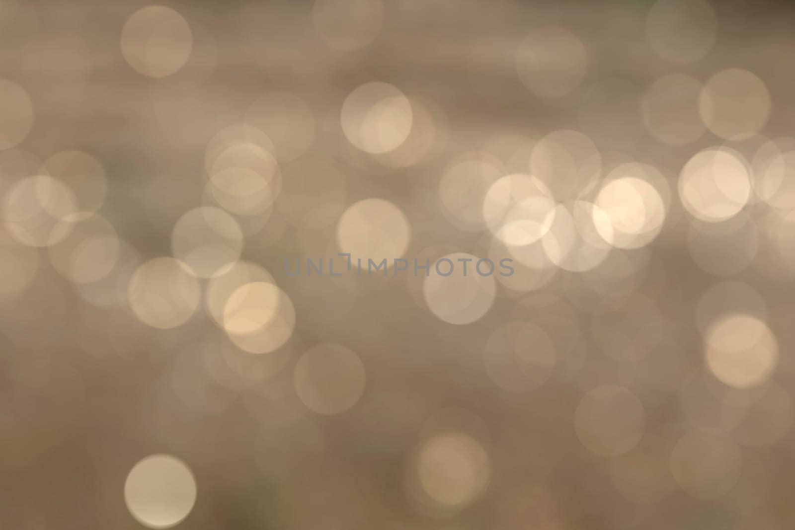 Abstract circular natural light orange bokeh background