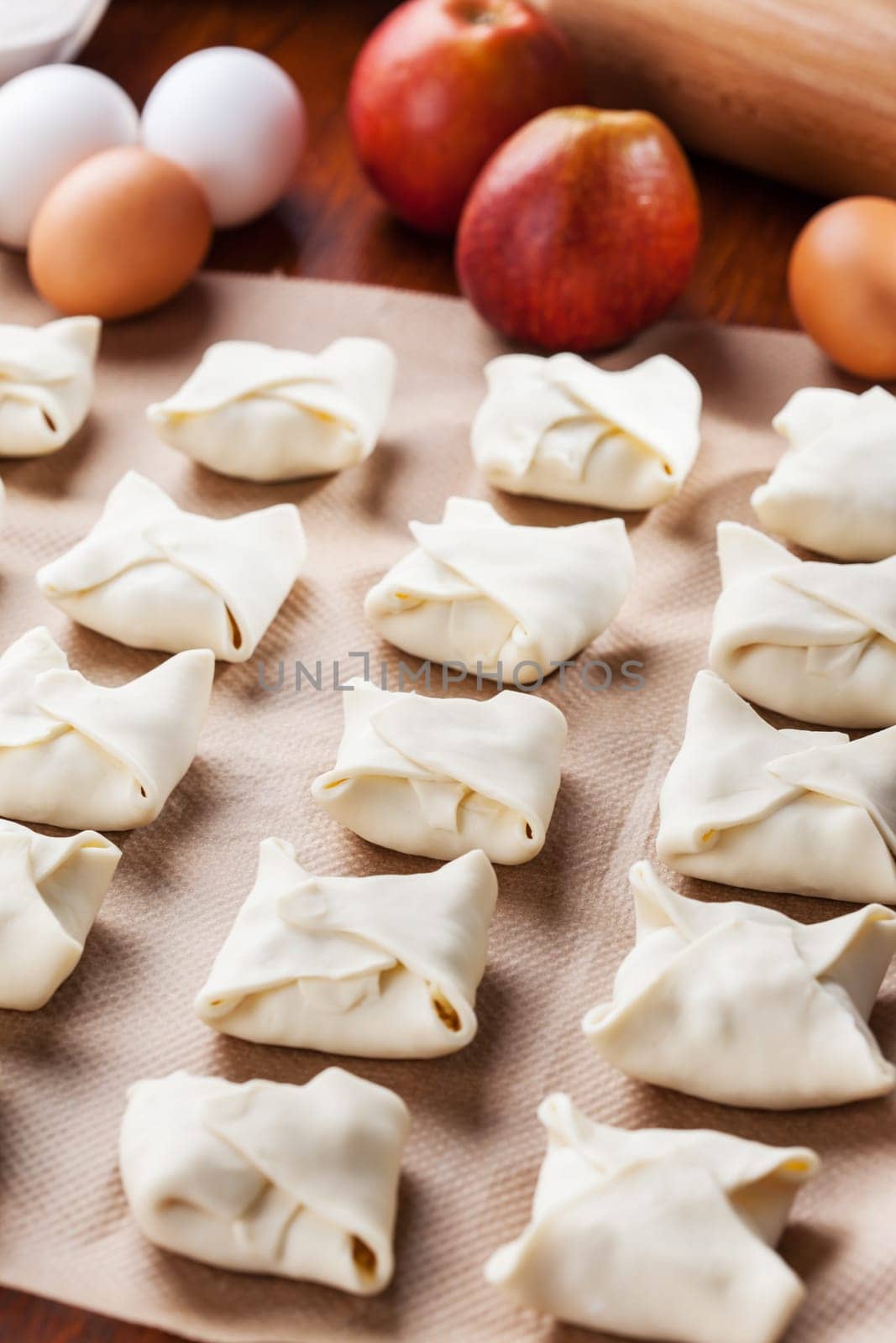 Delicious apple turnovers with baking ingredients