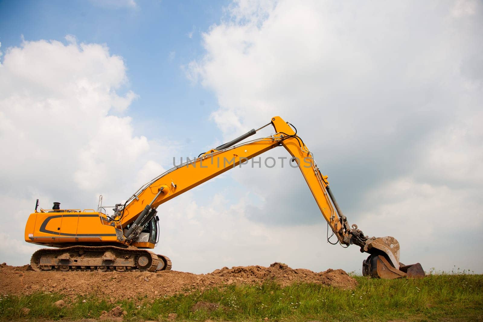 Excavator building a dike in the Netherlands.