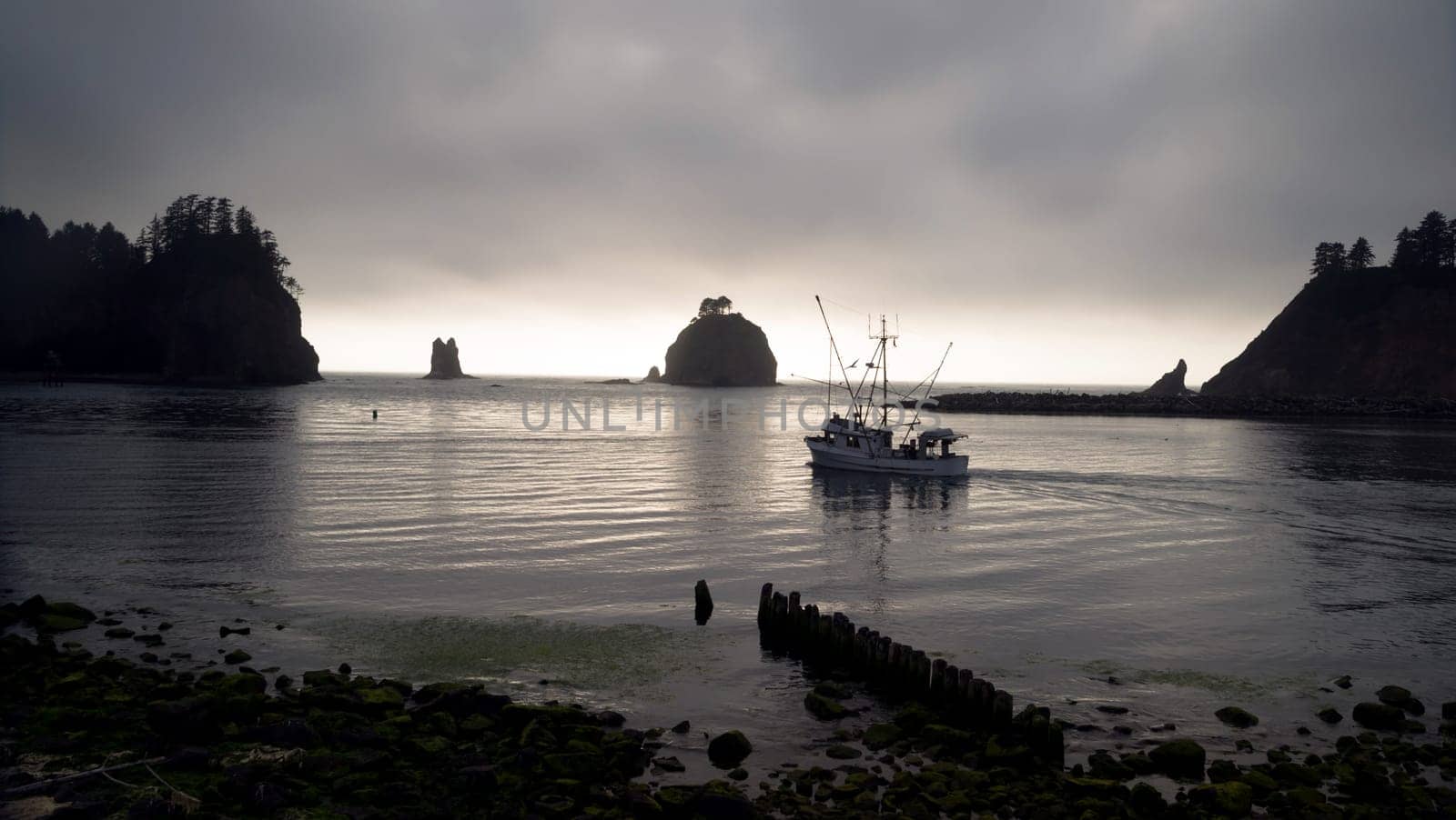 A fisherman heads out to work some more before sunset from the Marina in LaPush