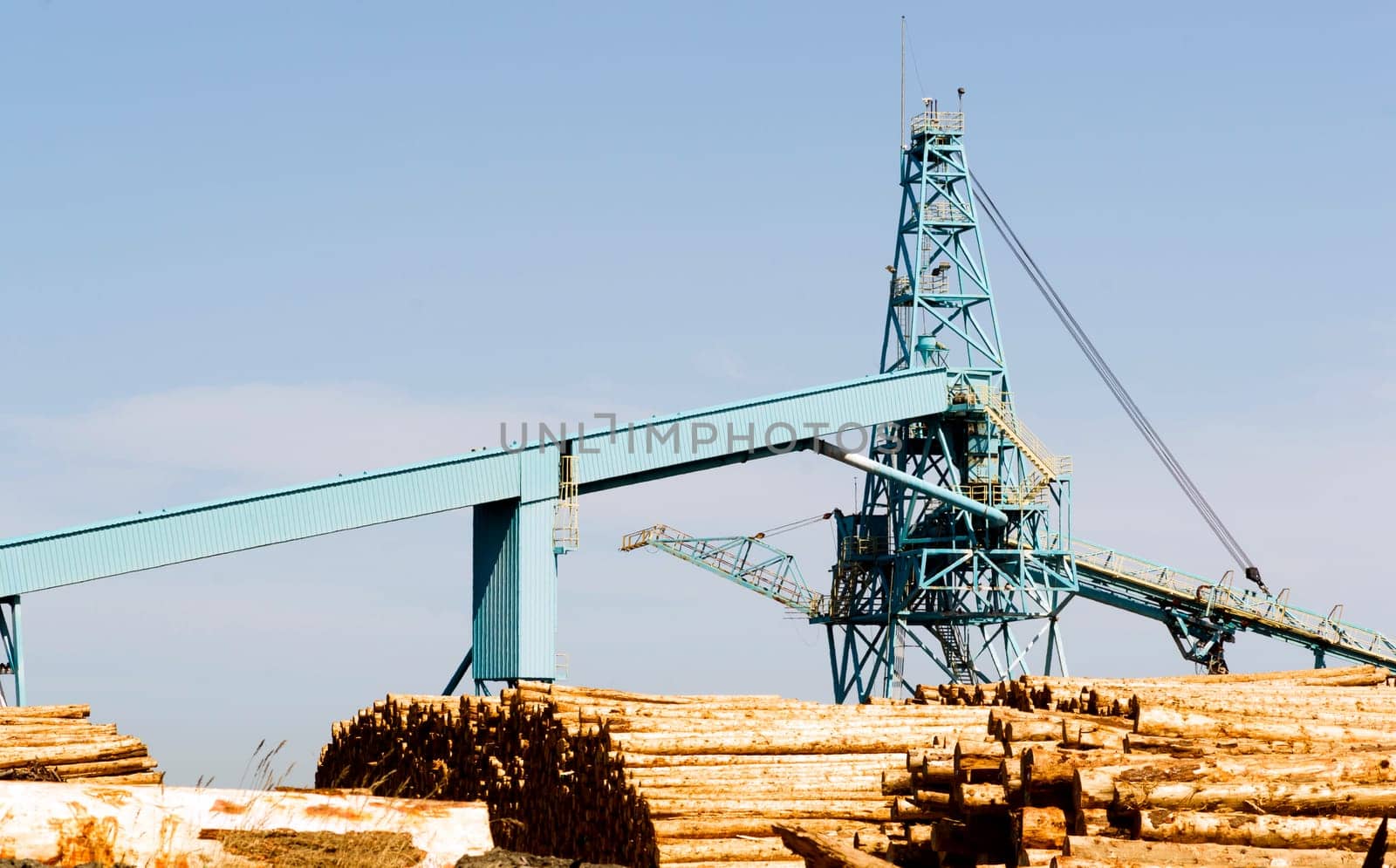 PLatform next to the water at a paper log storage yard