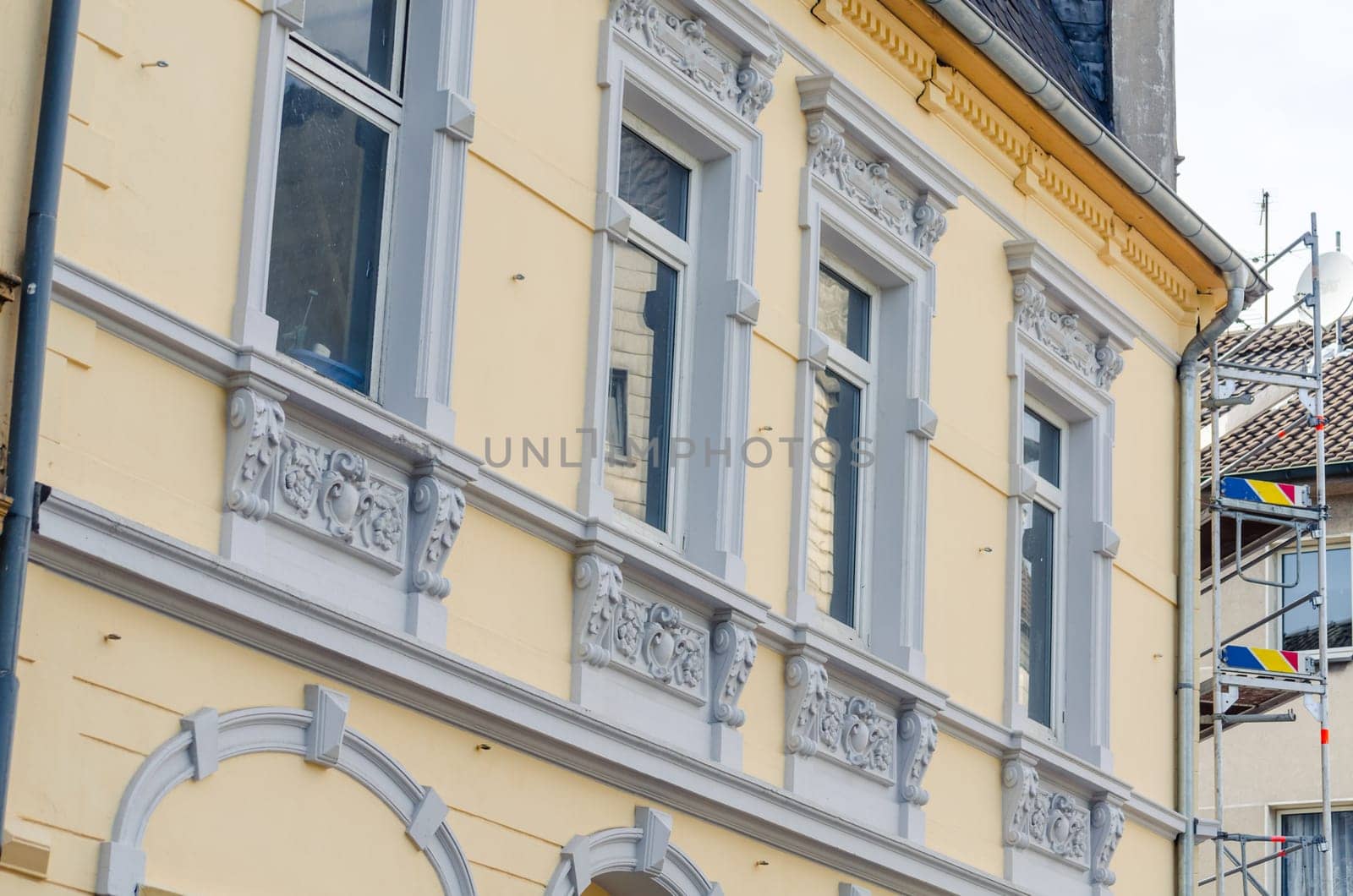 View of a newly renovated and painted house facade.