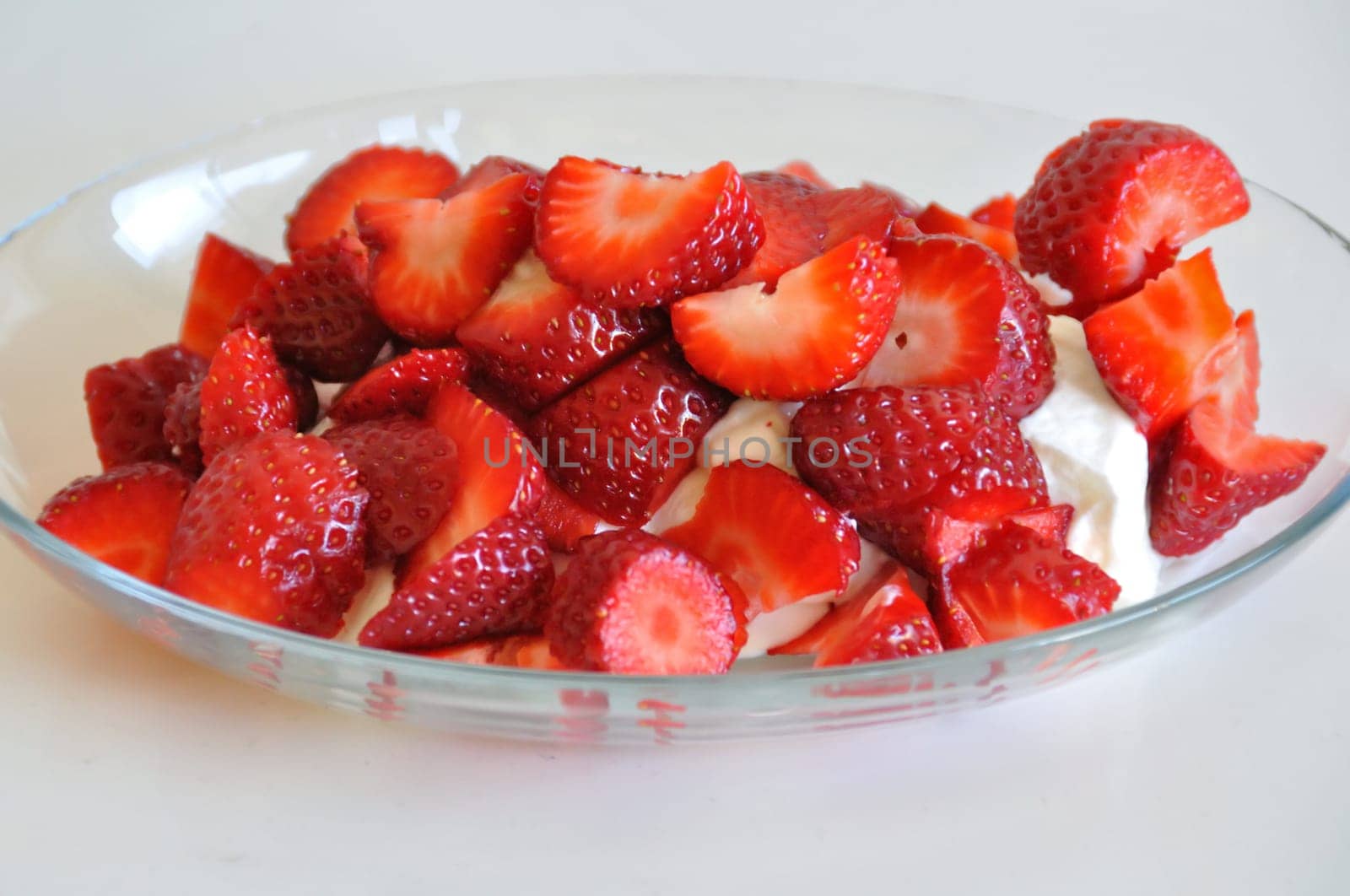 Fresh strawberries and yogurt dessert fruit background.