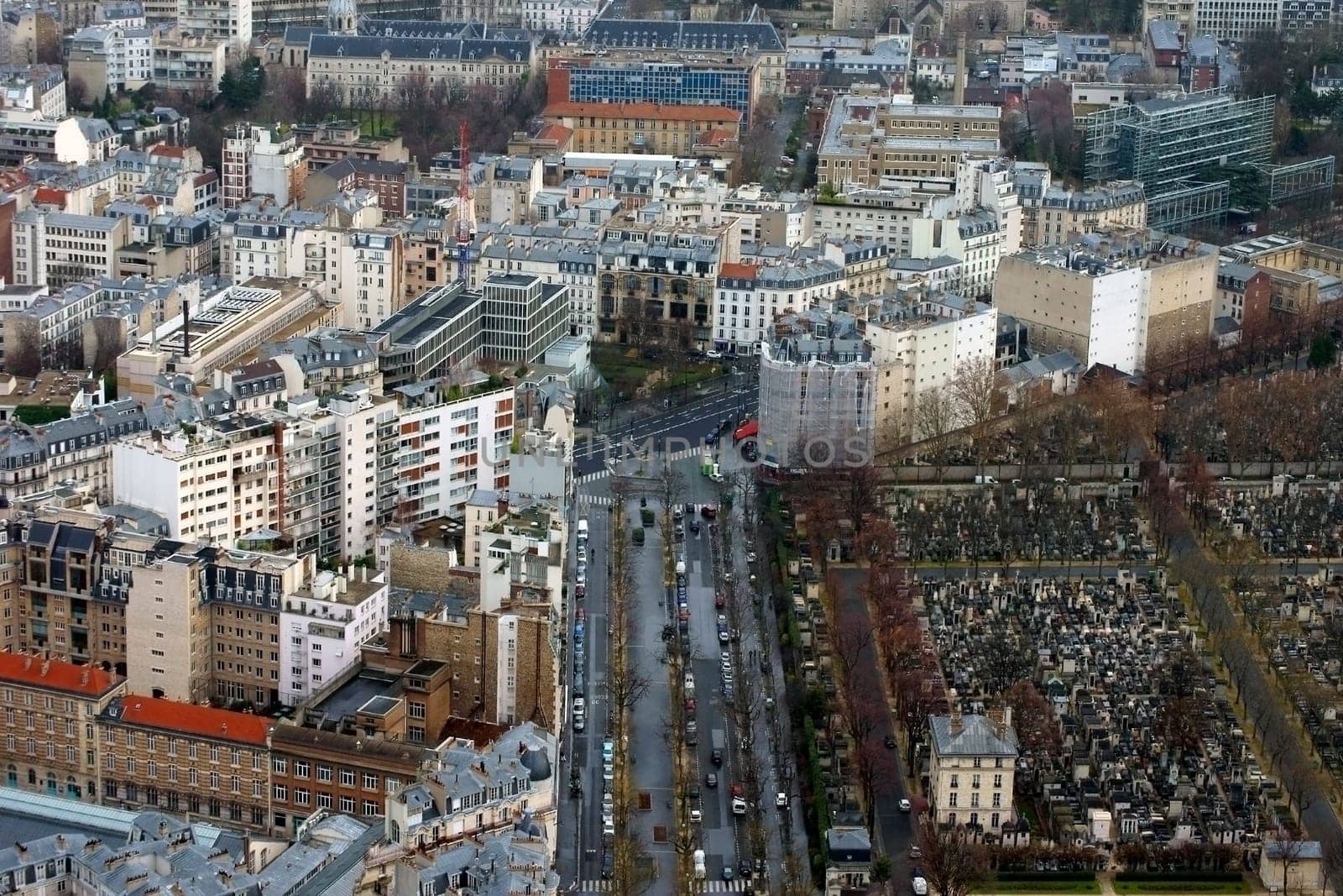 Paris,France – December 31,2013: An aerial view of a cemetery,infrastructure and transport on December 31,2013 in Paris.