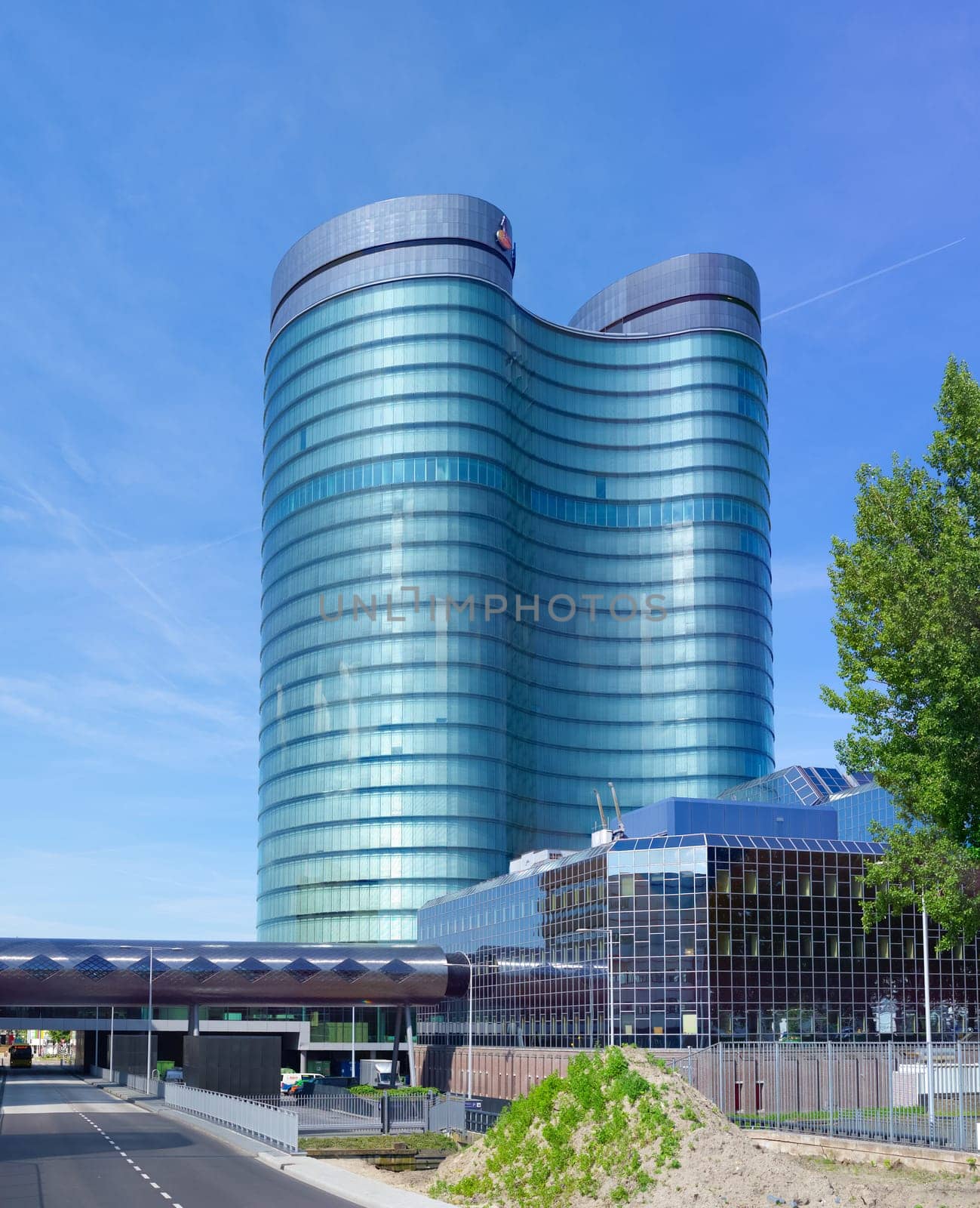 modern rabobank headquarters building in utrecht, netherlands. Rabobank is a Dutch bank, consisting of 136 (2013) independent cooperatives with all its own banking license from the Dutch Central Bank
