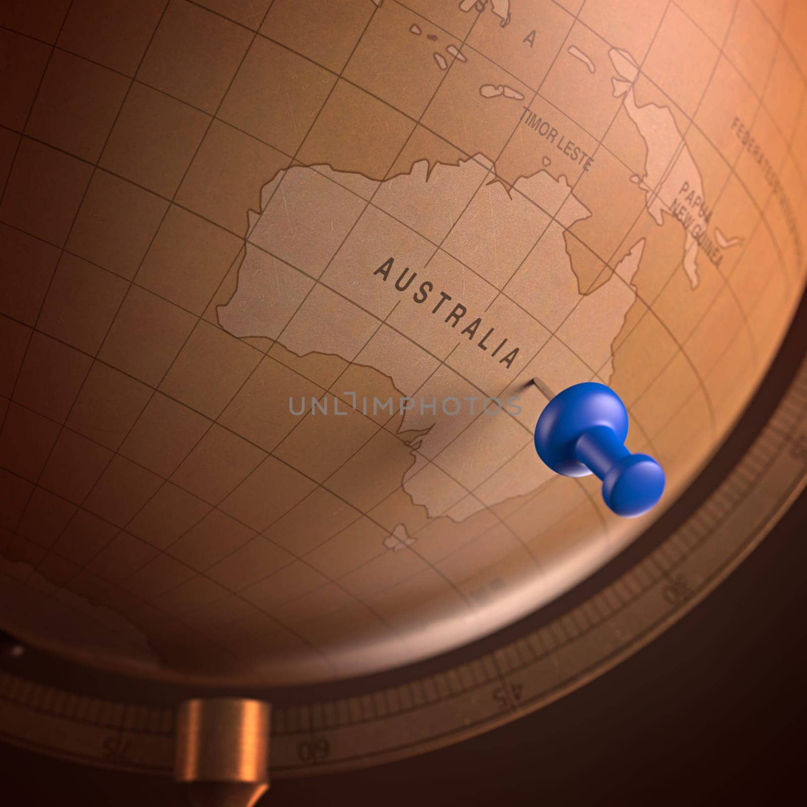 Antique globe with the Australia marked by the pin. Clipping path included.