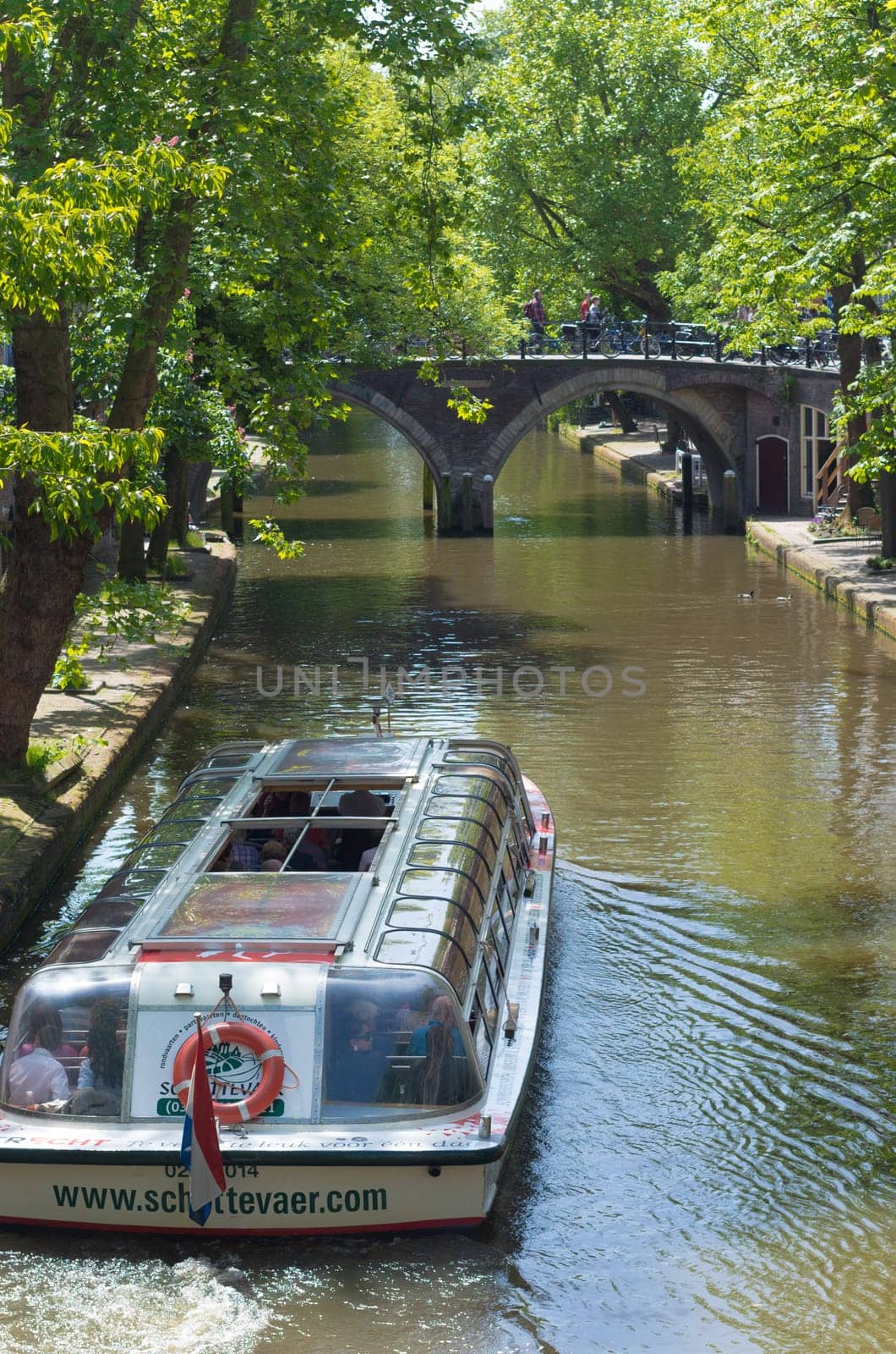 sightseeing boat in a canal in Utrecht, Netherlands