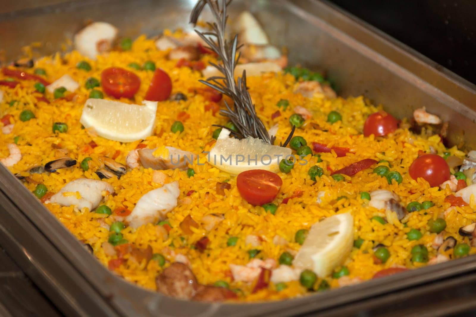 Rice with tomatoes on a warm buffet