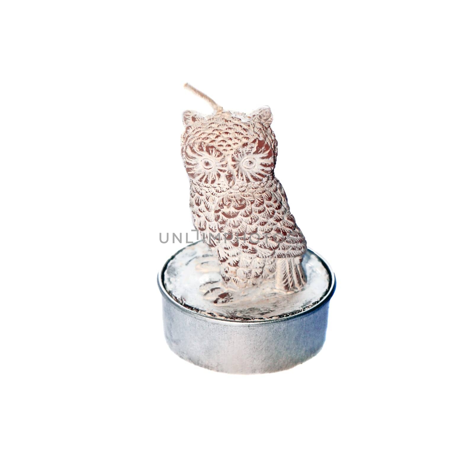 Wax owl candle close up isolated