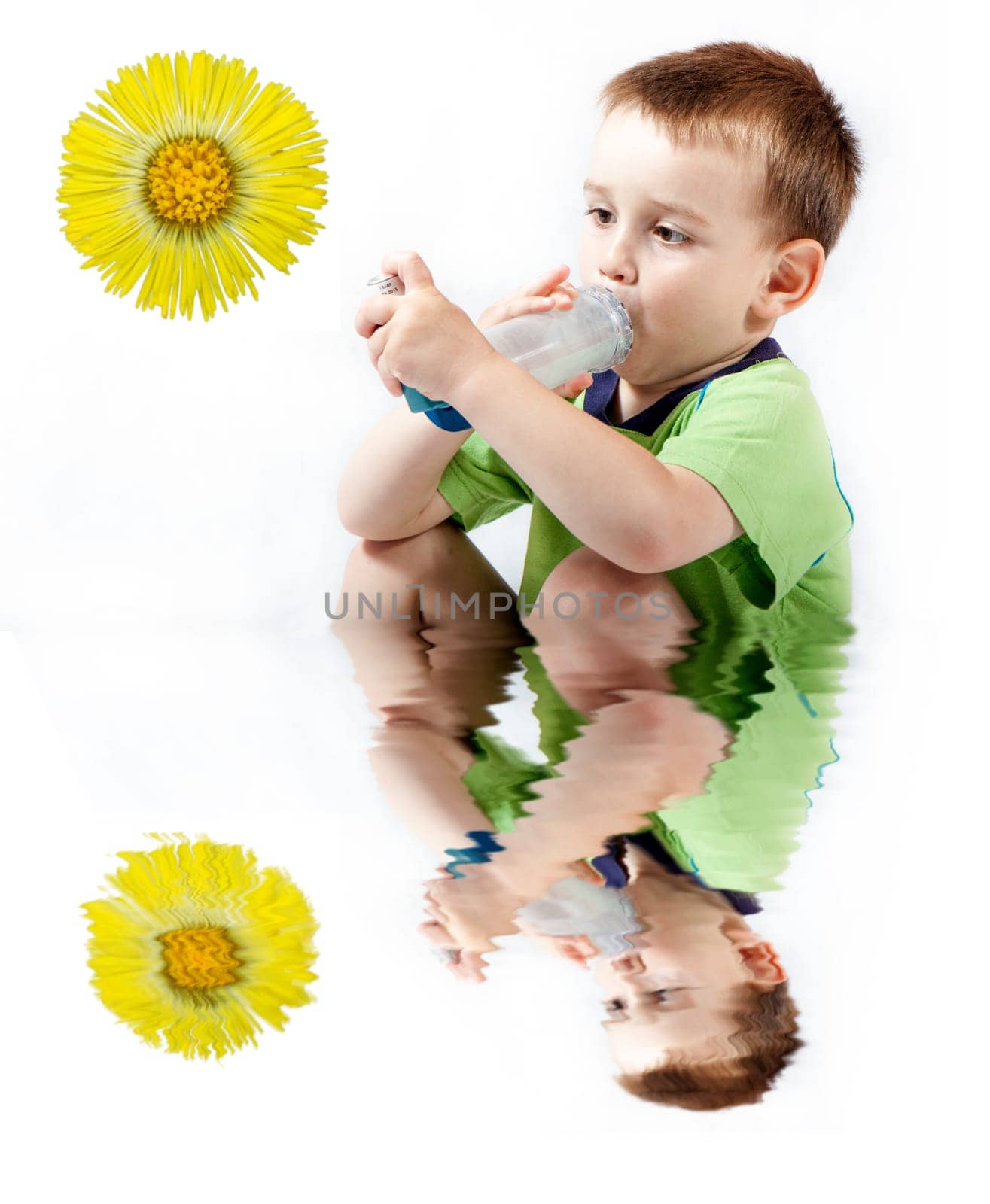 Little boy using inhaler for asthma isolated on white background