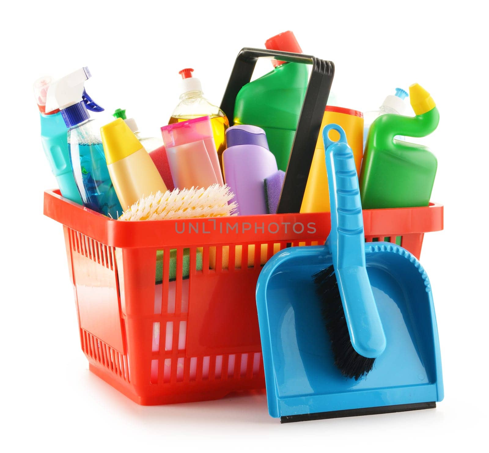 Shopping basket with detergent bottles and chemical cleaning supplies isolated on white