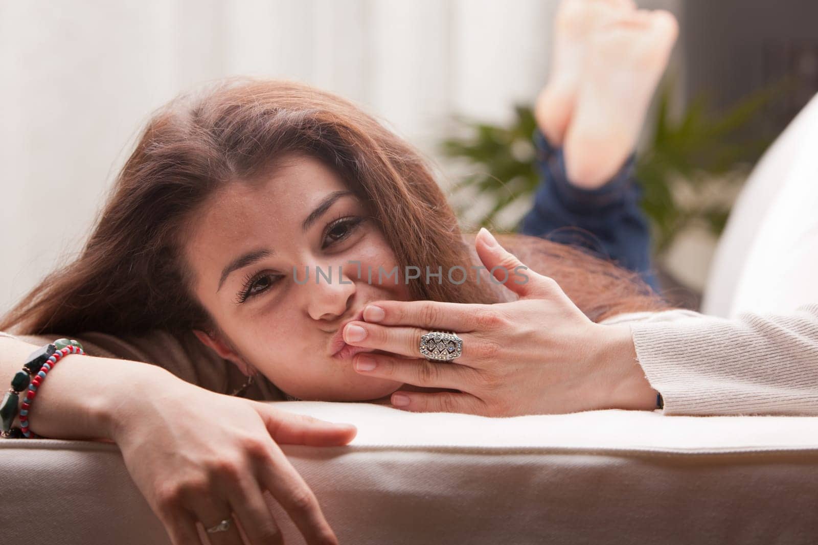 gentle girl sending a soft little kiss to you
