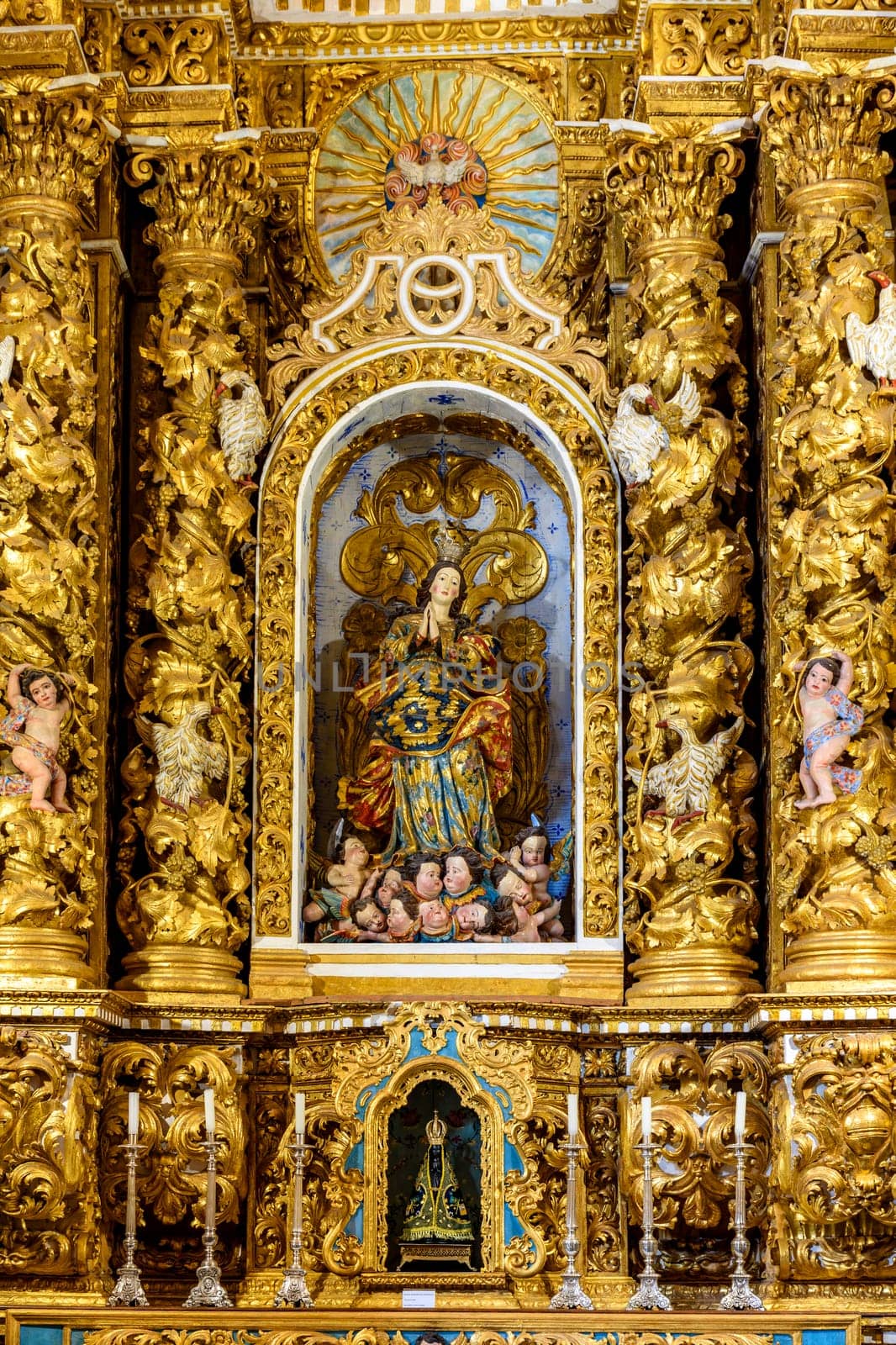 Baroque altar with gold leaf in the historic church of Pelourinho in the city of Salvador, Bahia