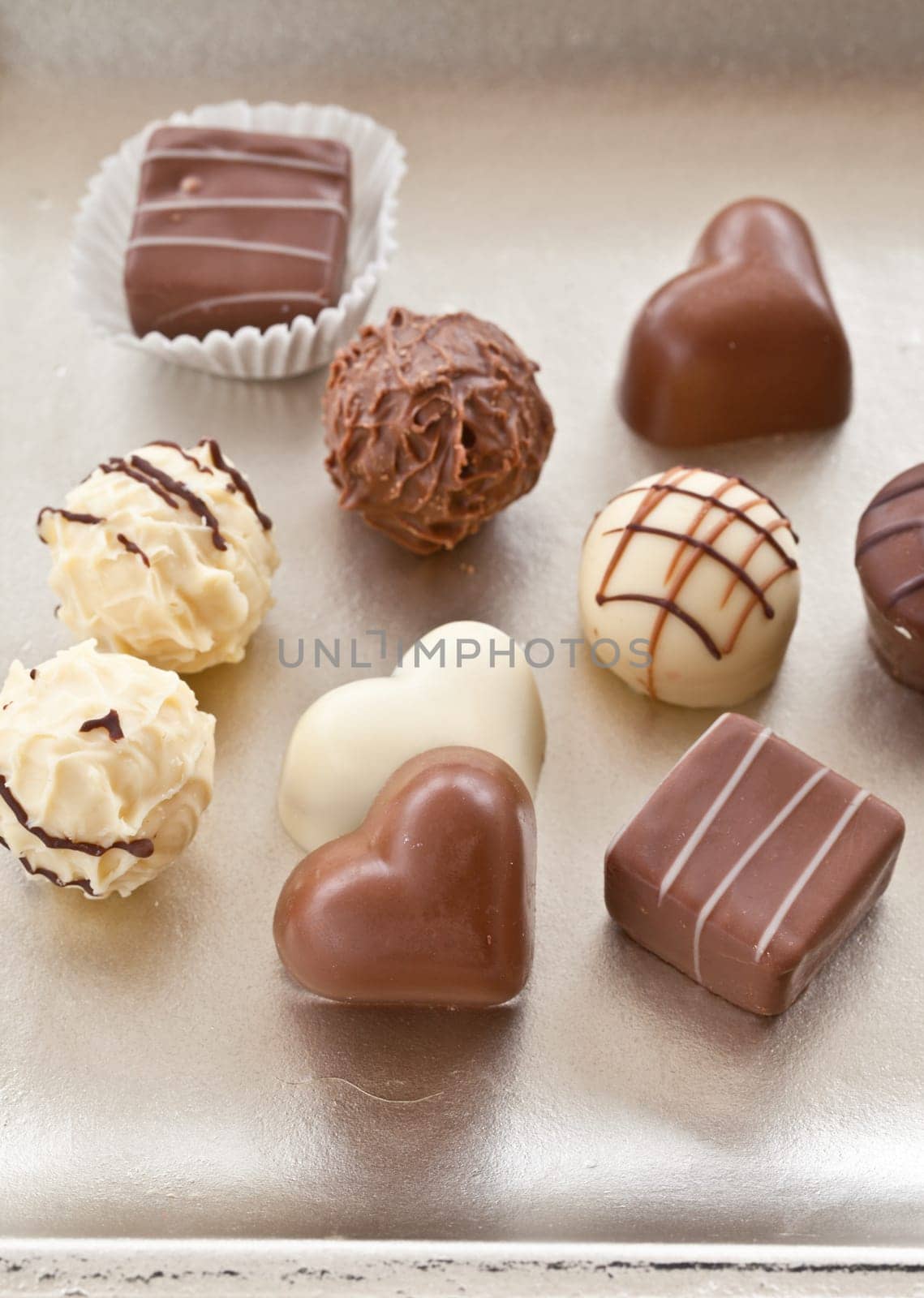 Various chocolates in heart shape and chocolates