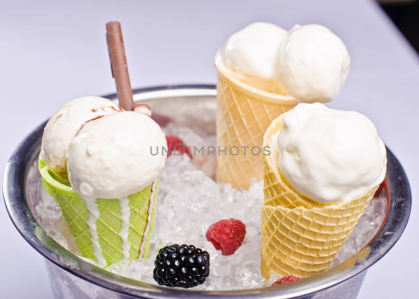 Ice cream in an ice bucket and fruit