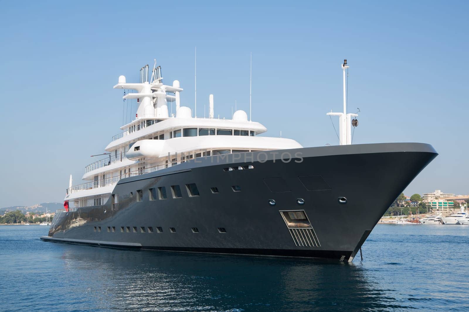 Gigantic big and large luxury mega or super motor yacht. Investment for millionaires or billionaires.