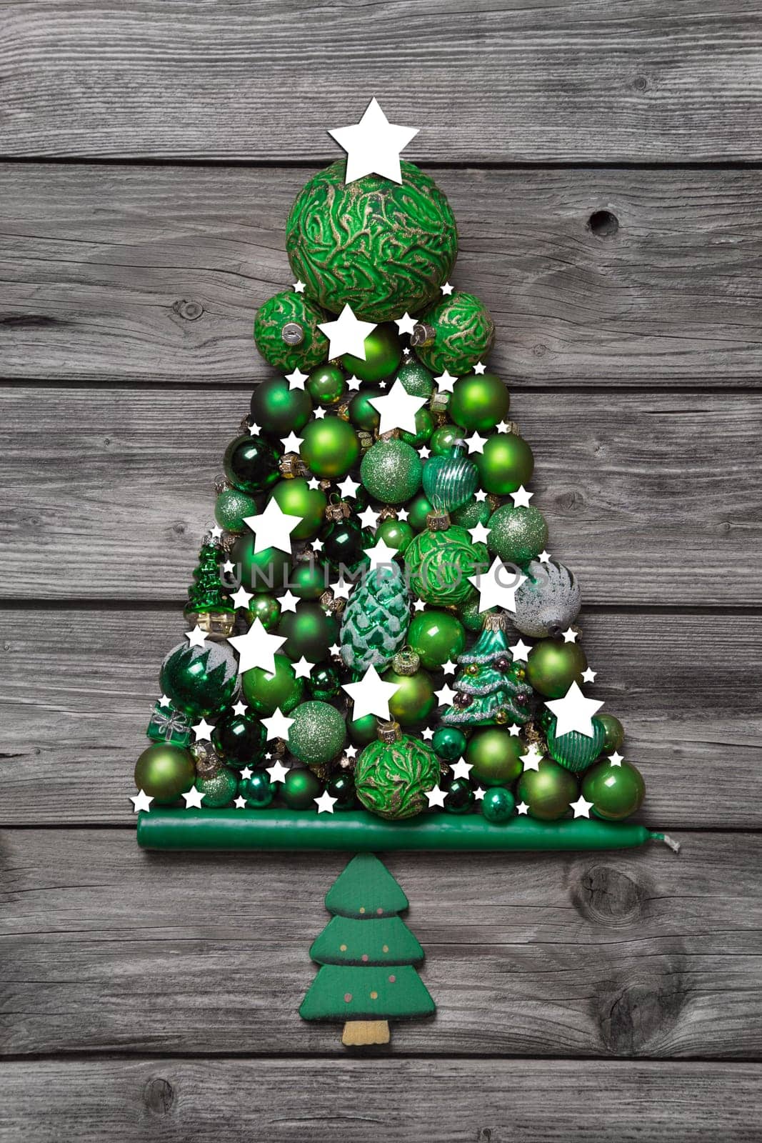 Green traditional christmas decoration with wood