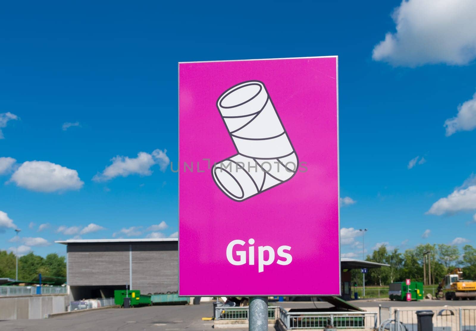 shield with gypsum cast symbol at a household waste processor