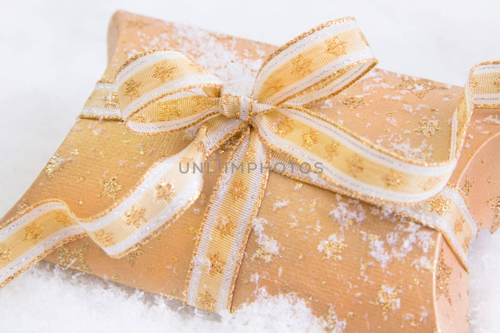 Close up of golden present box for christmas