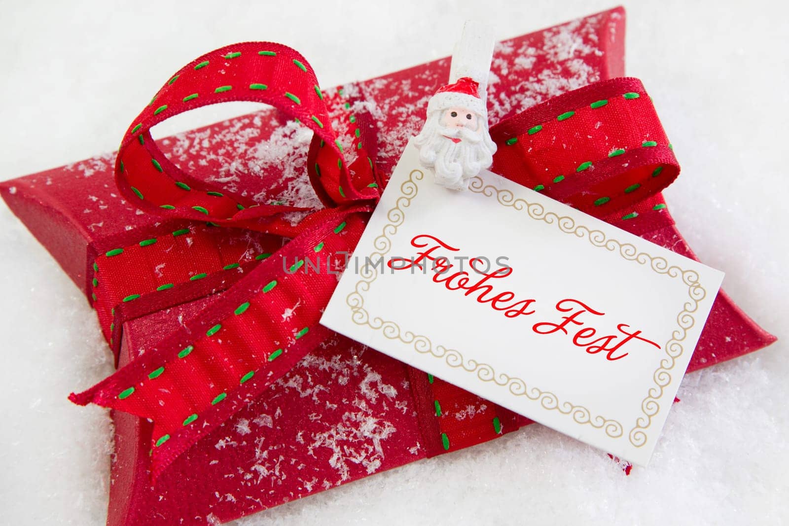 Close up of red present box with German text for christmas
