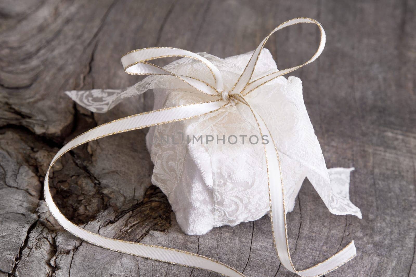 Close up of present box on wooden background for christmas..