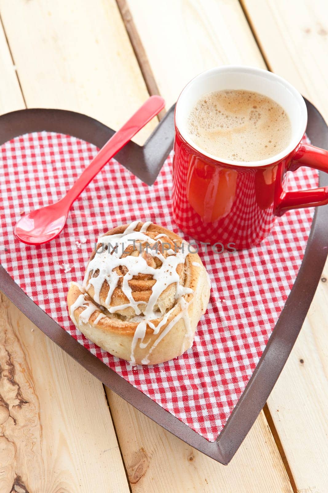 Fresh Swedish cinnamon snail and coffee for a winter coffee break