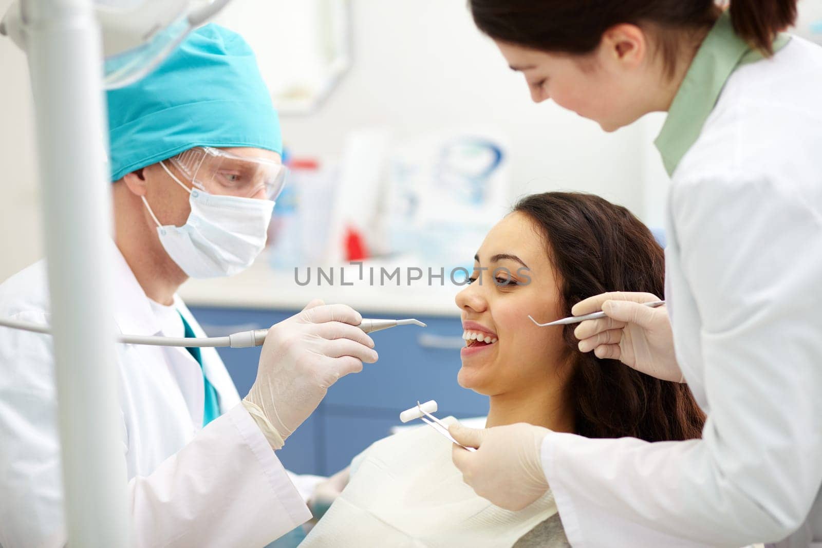 Pretty patient during dental check-up in clinic