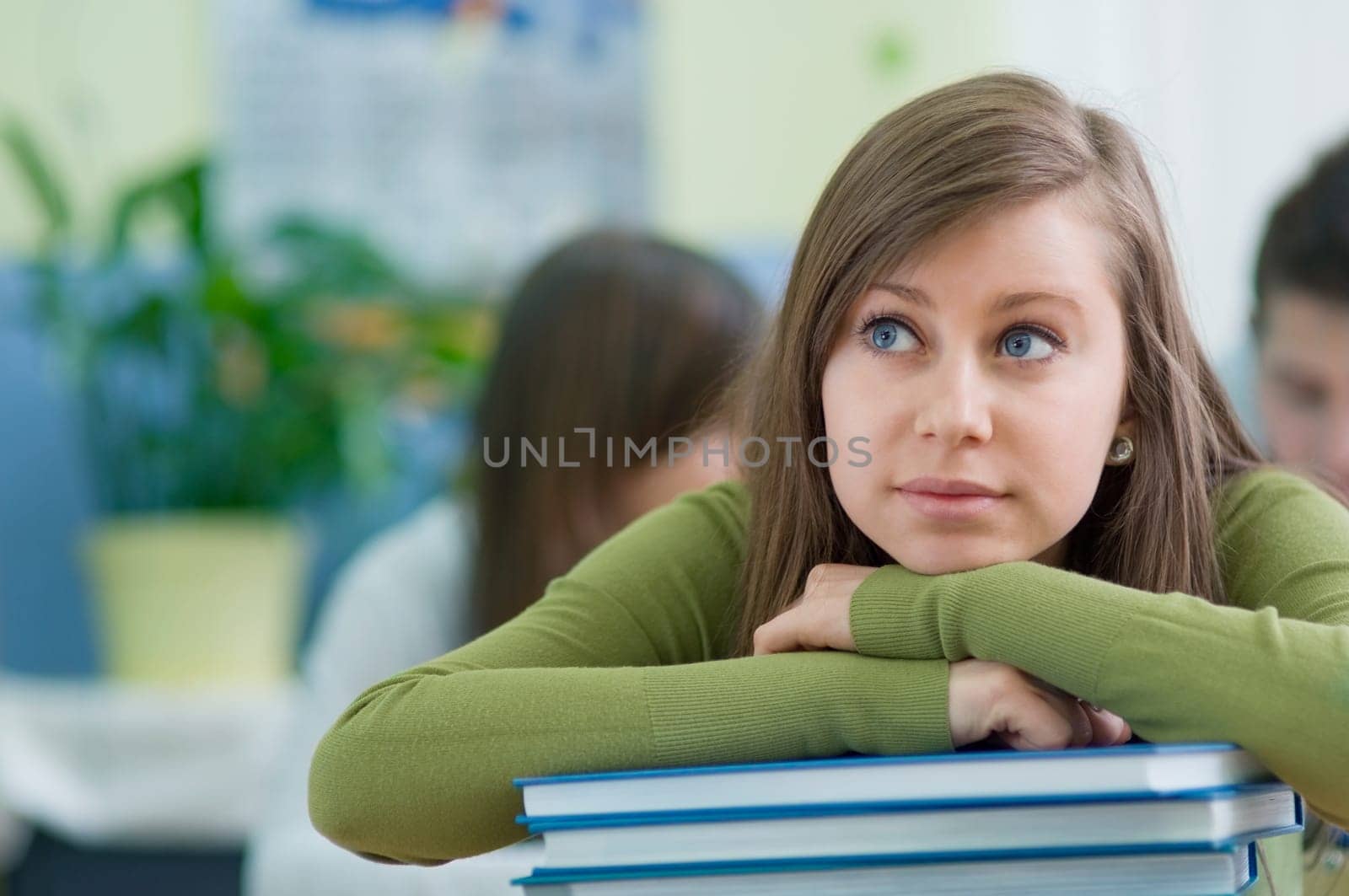 Student girl thinking about break