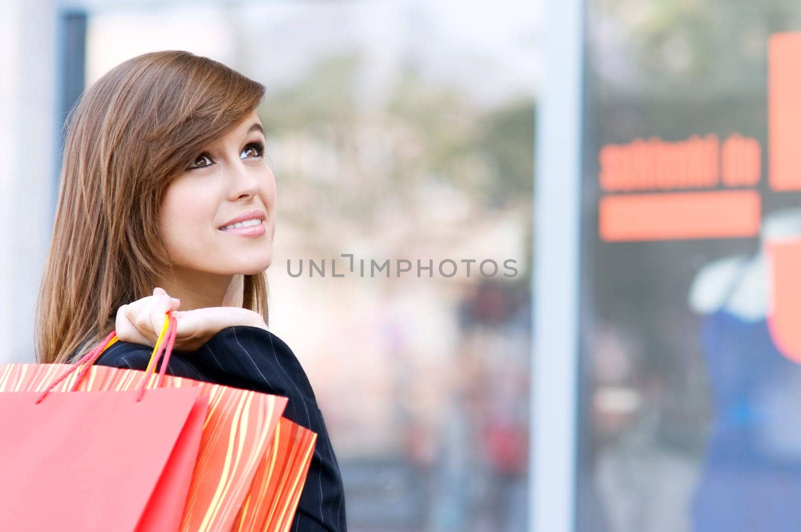 Young woman with shopping bags