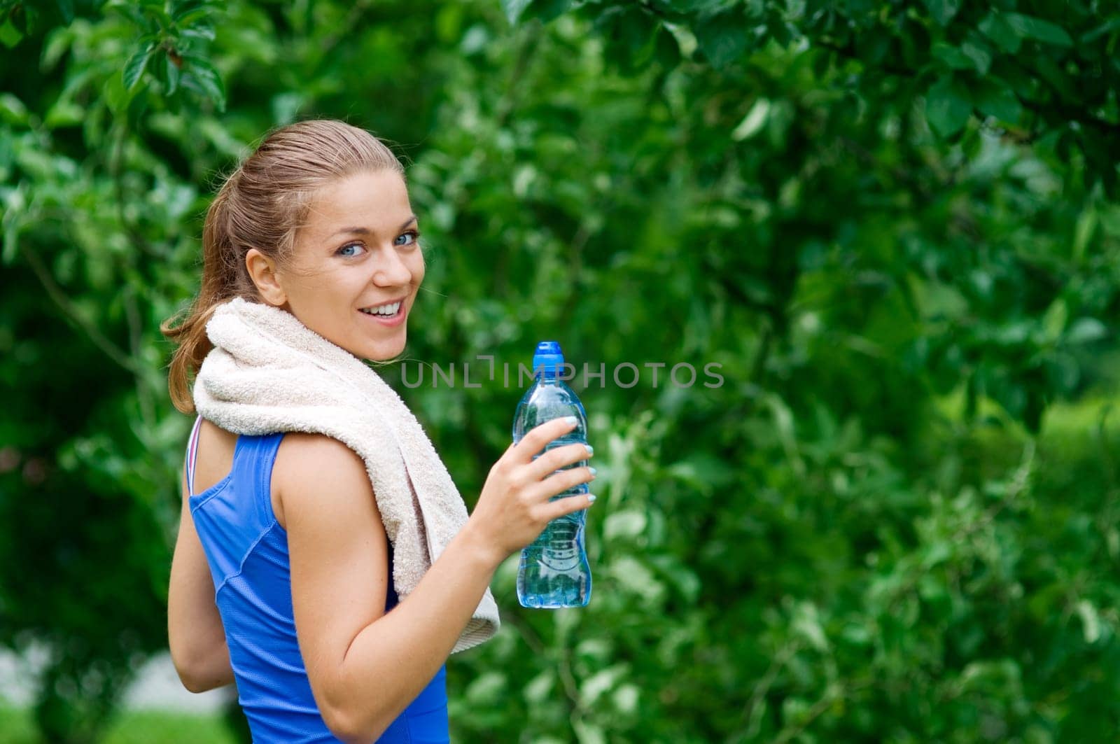 Smiling woman after workout