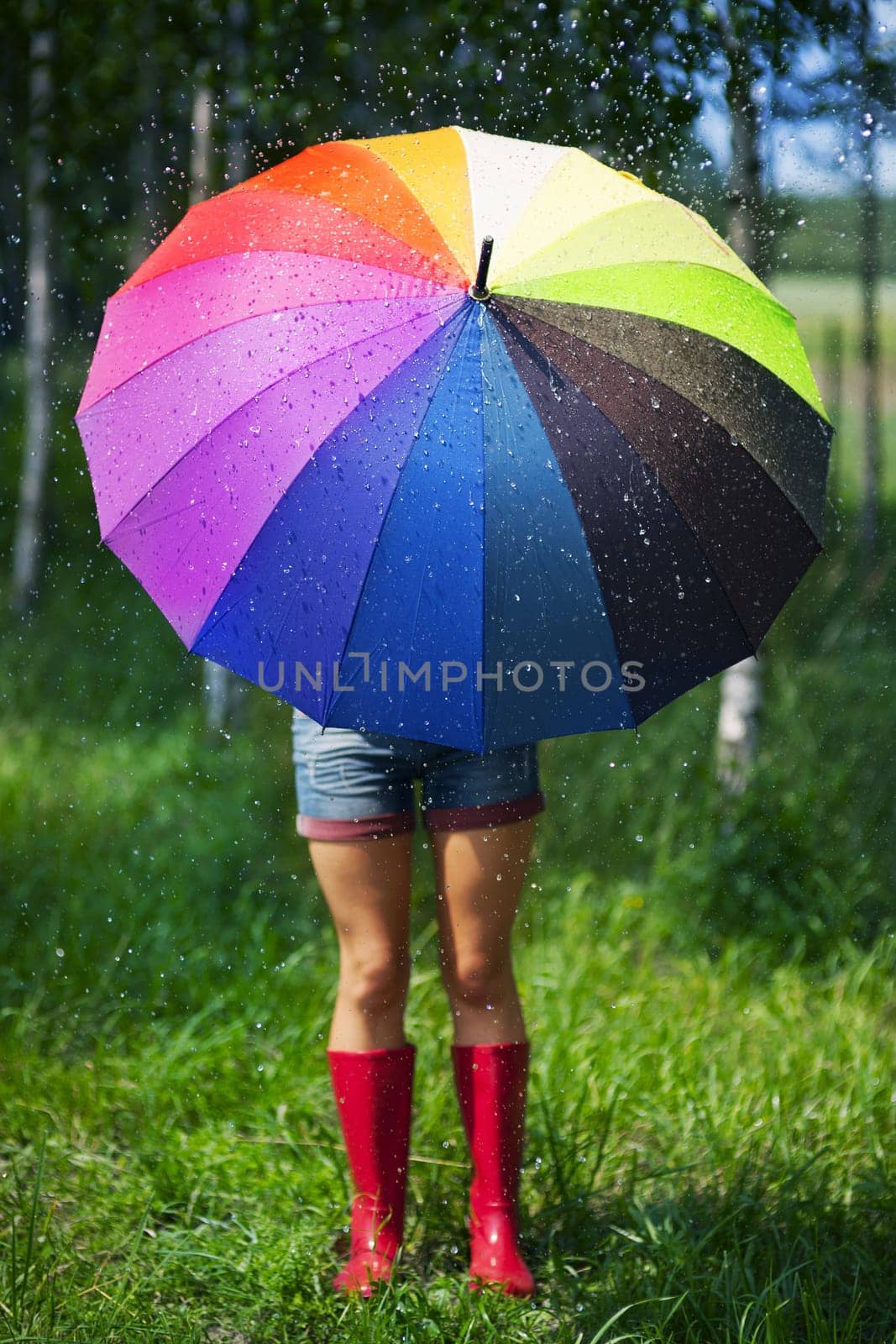 Woman protecting herself from the rain
