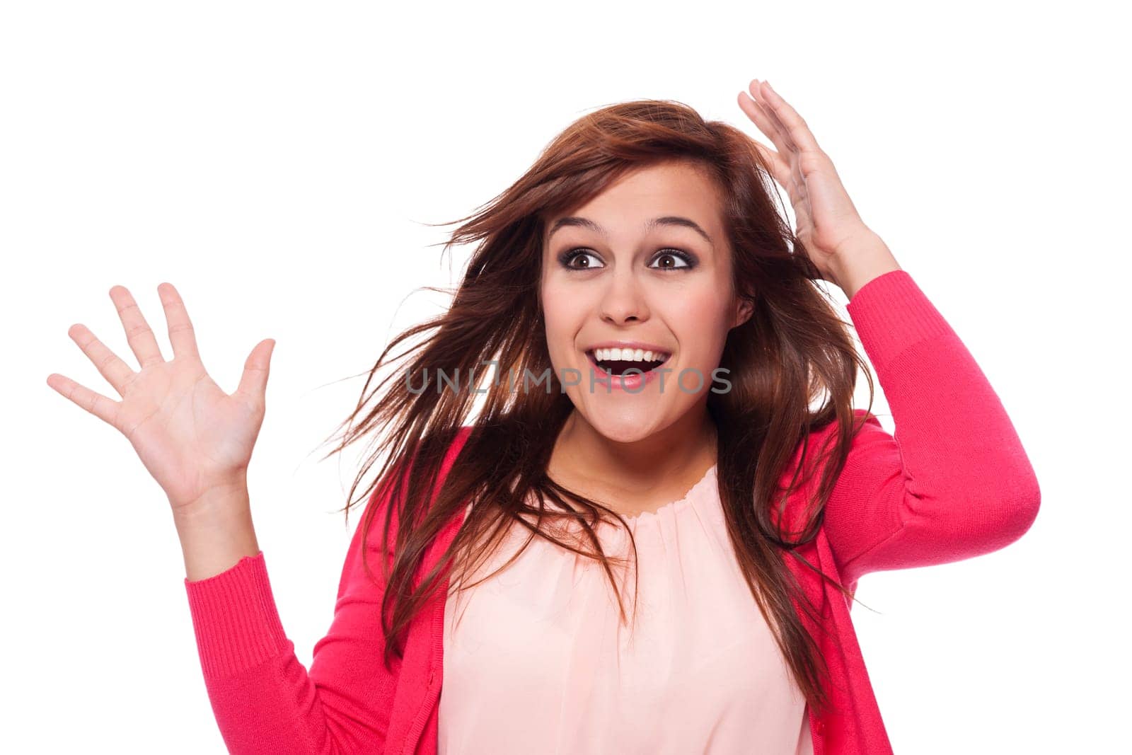 Surprised young woman with hand raised