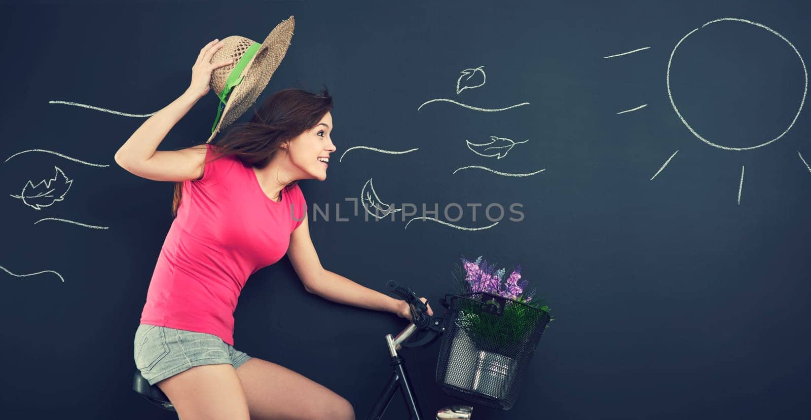 Woman with hat during cycling