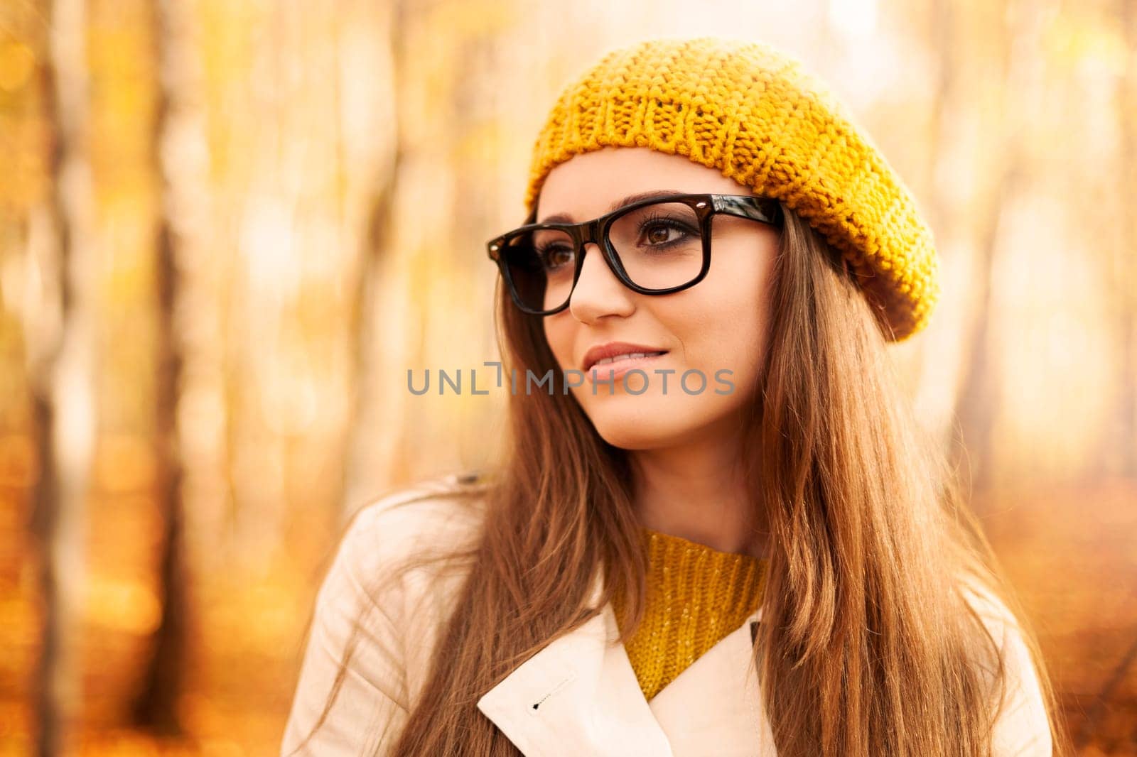 Portrait of beautiful woman wearing fashion glasses during the autumn