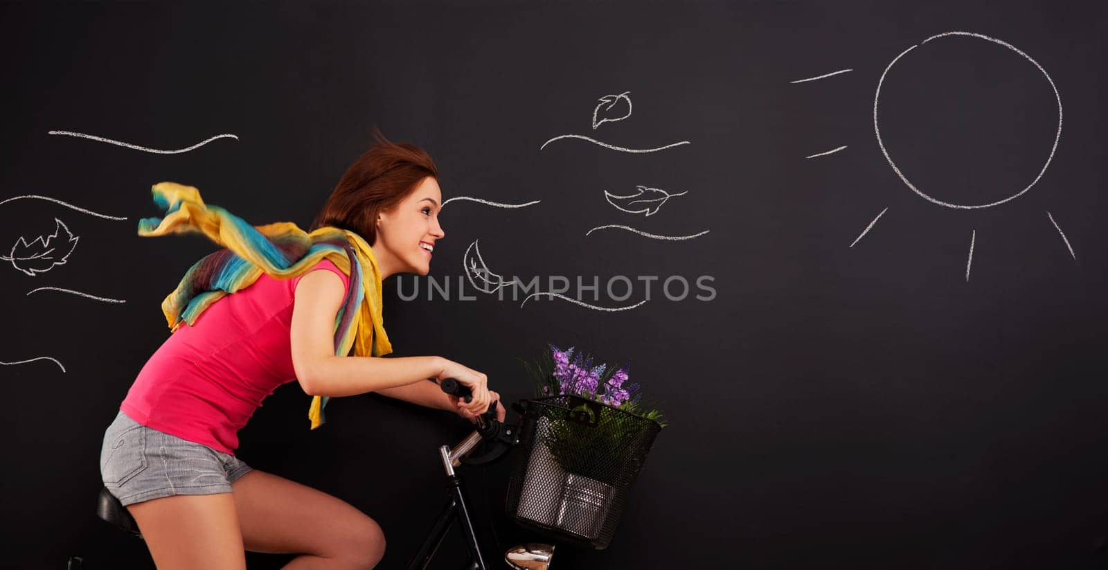 Happy woman on a bicycle