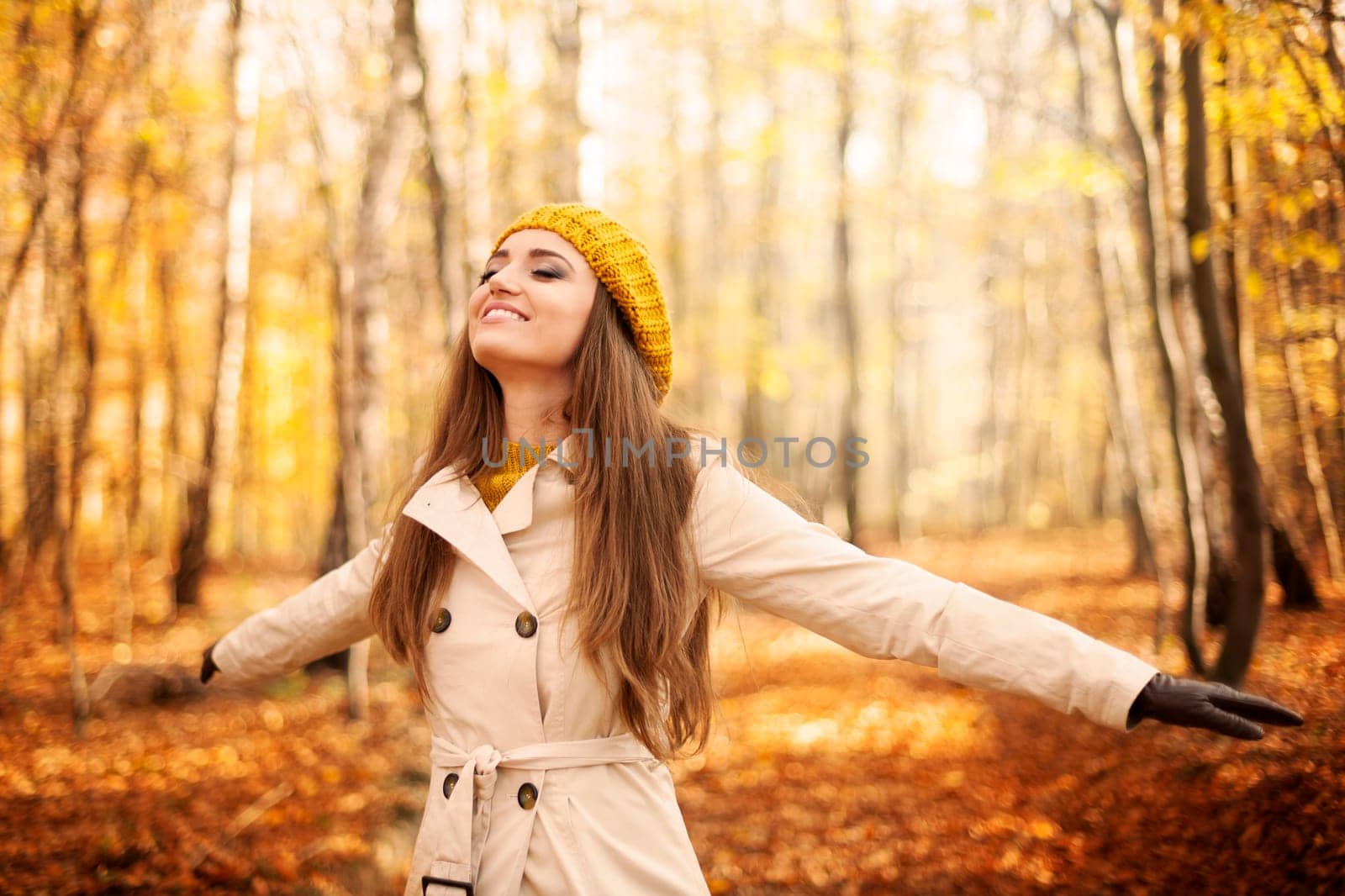 Young woman enjoying nature at autumn