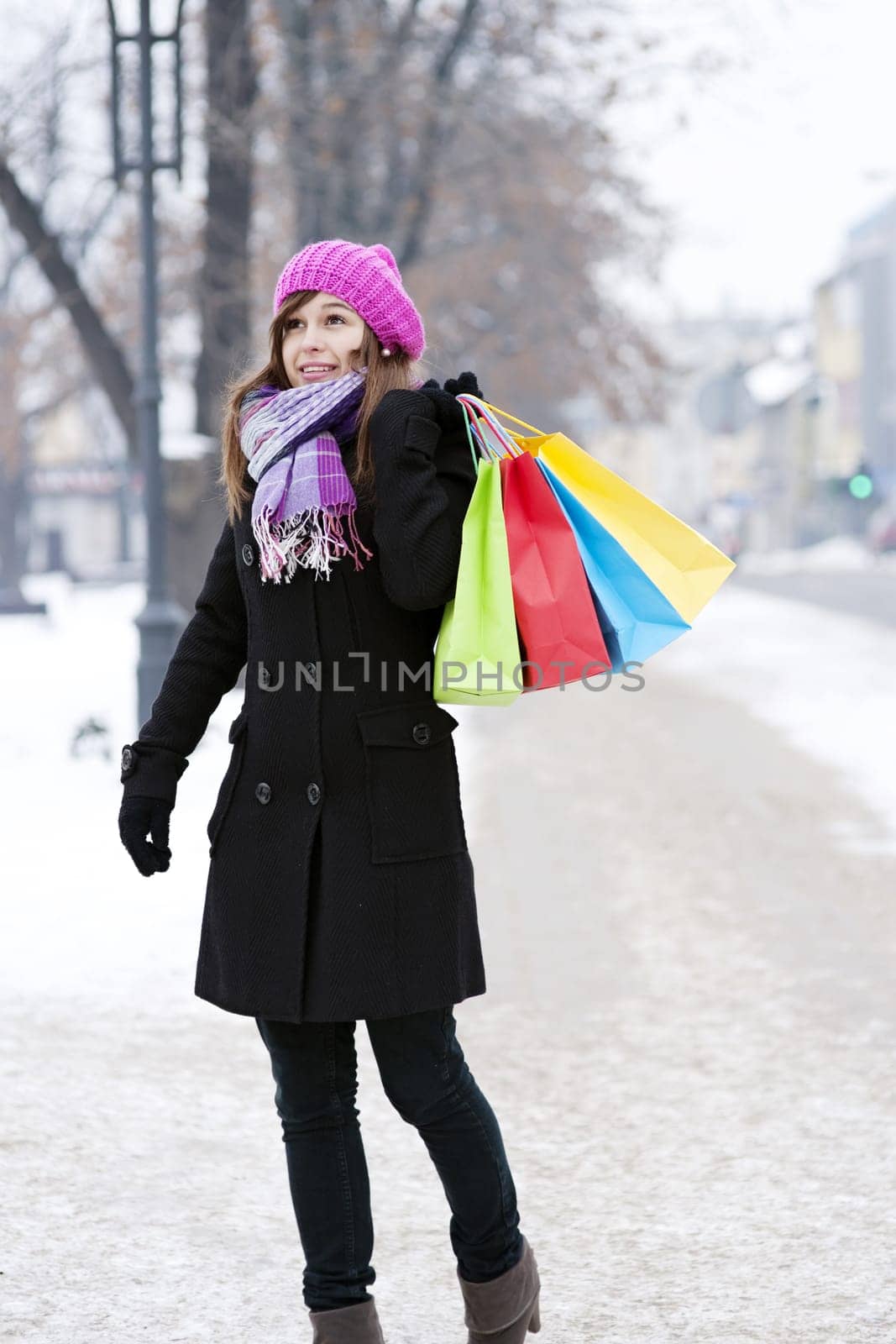 Young woman with shopping bags