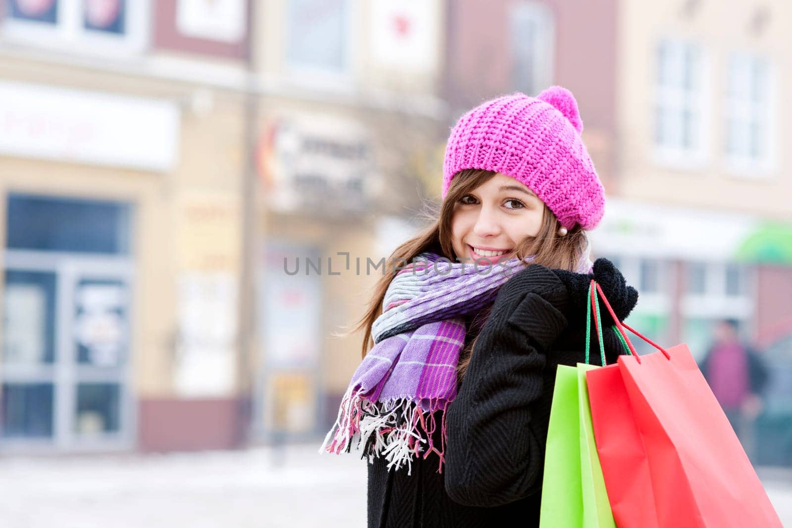 Young woman with shopping bags