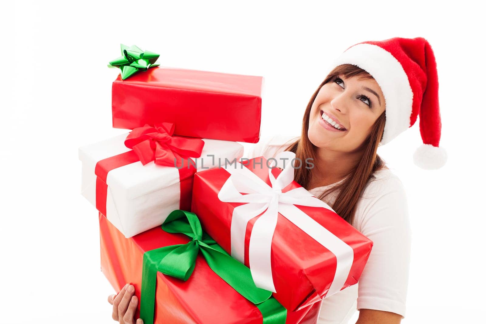 Happy woman with stack christmas gifts