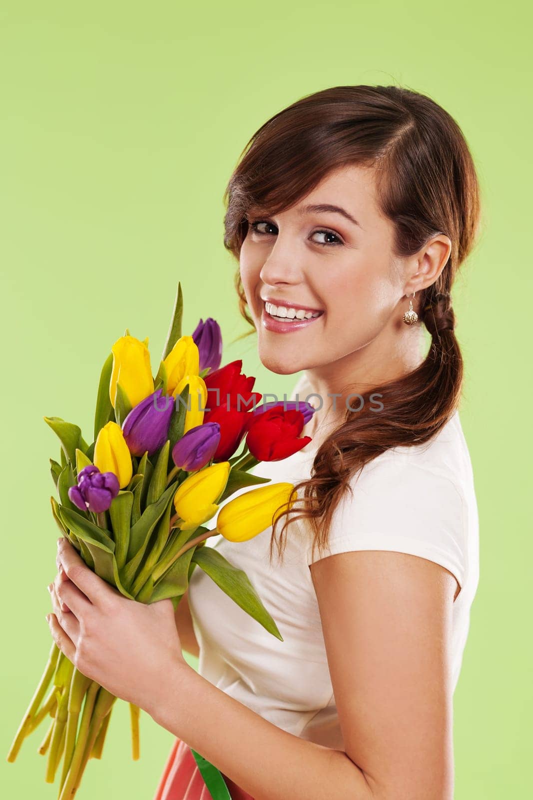 Portrait of a young woman with spring flowers