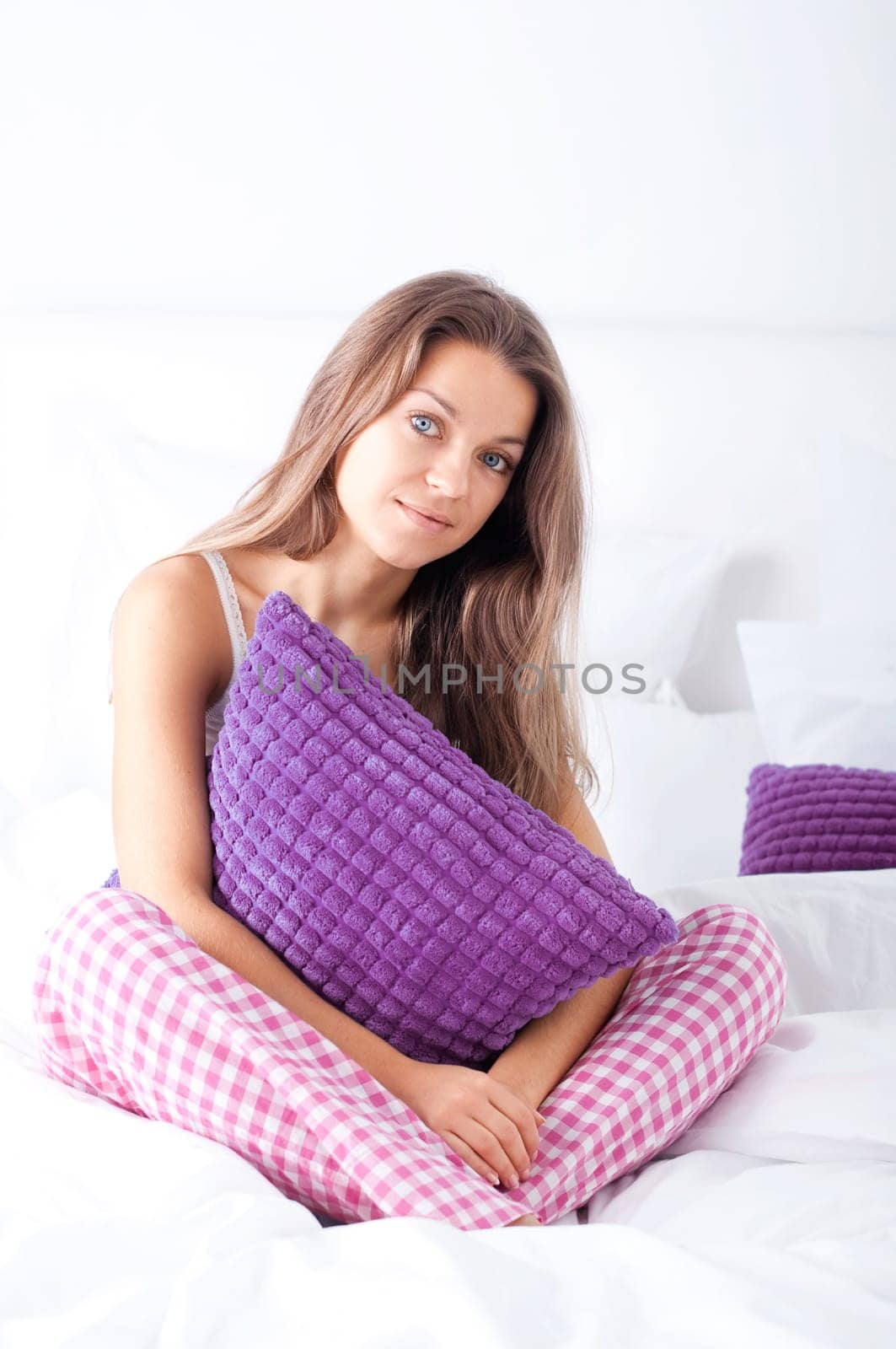 Young woman in bed