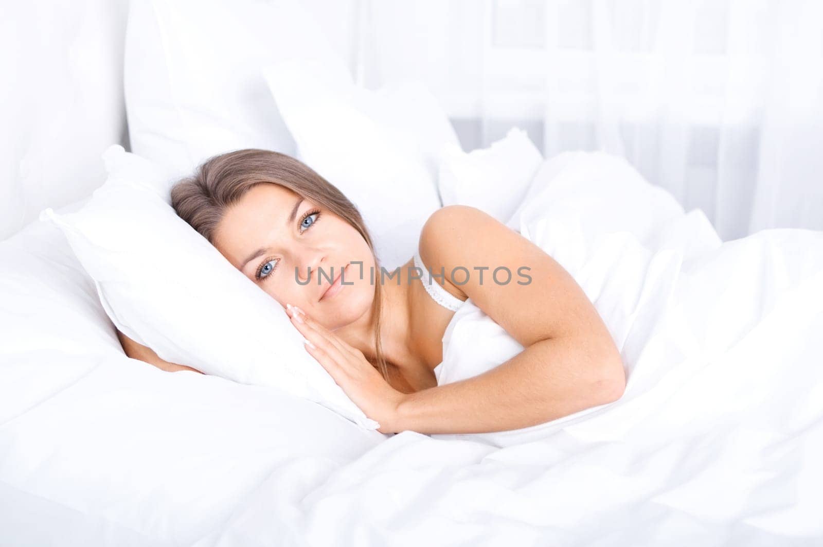 Woman resting in bed