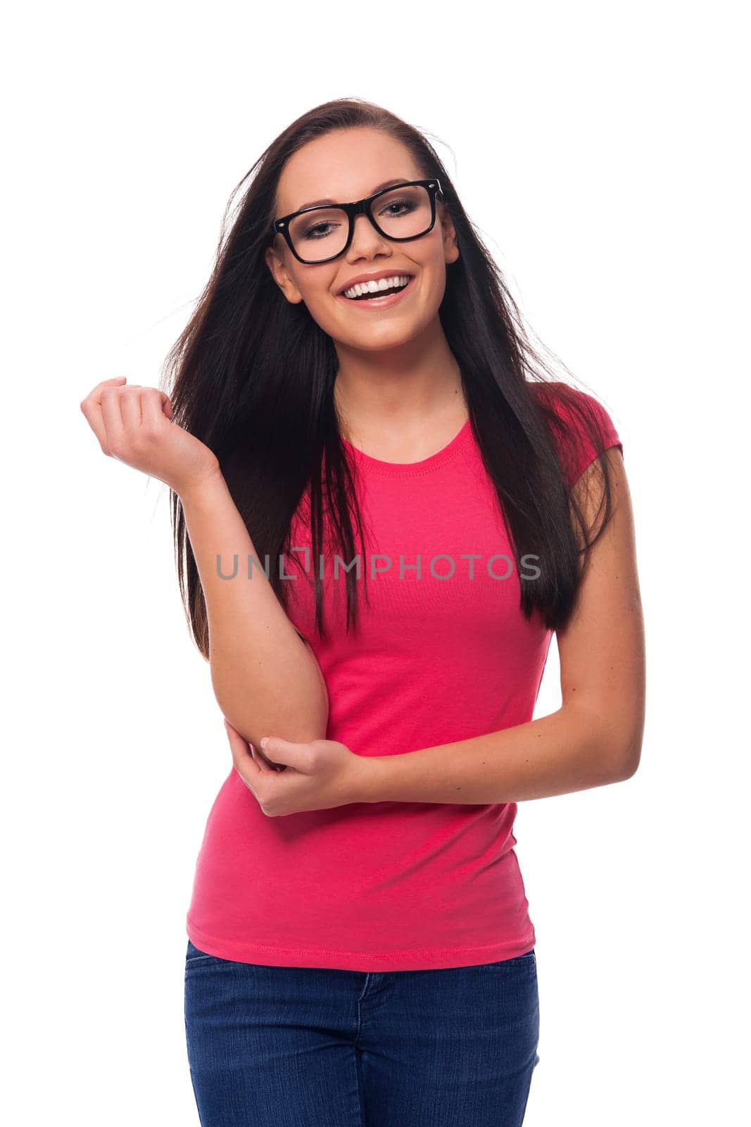 Portrait of smiling brunette woman wearing glasses