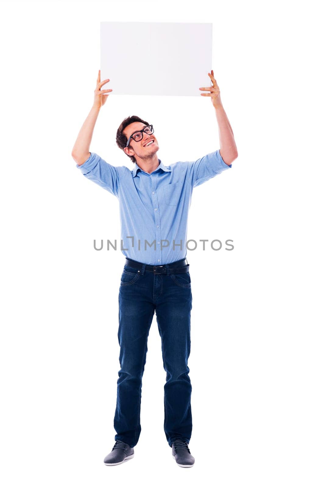 Handsome man holding a blank sign overhead