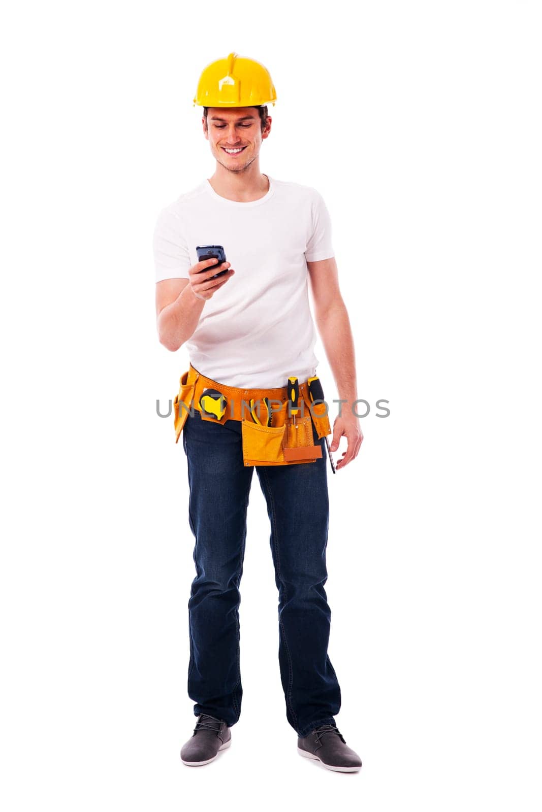 Happy construction worker with smart phone